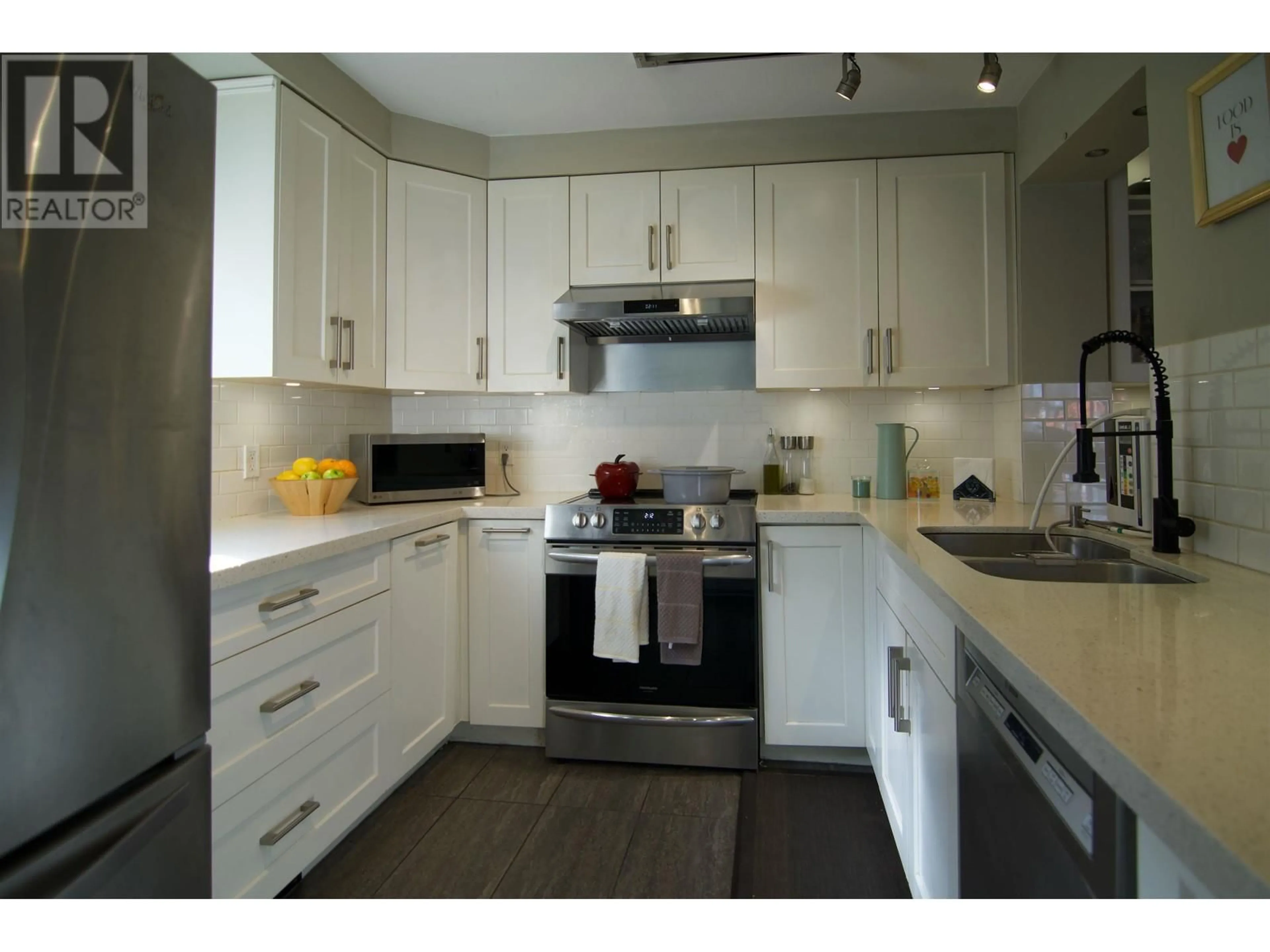 Standard kitchen, wood/laminate floor for 101 - 3055 CAMBIE STREET, Vancouver British Columbia V5Z4N2
