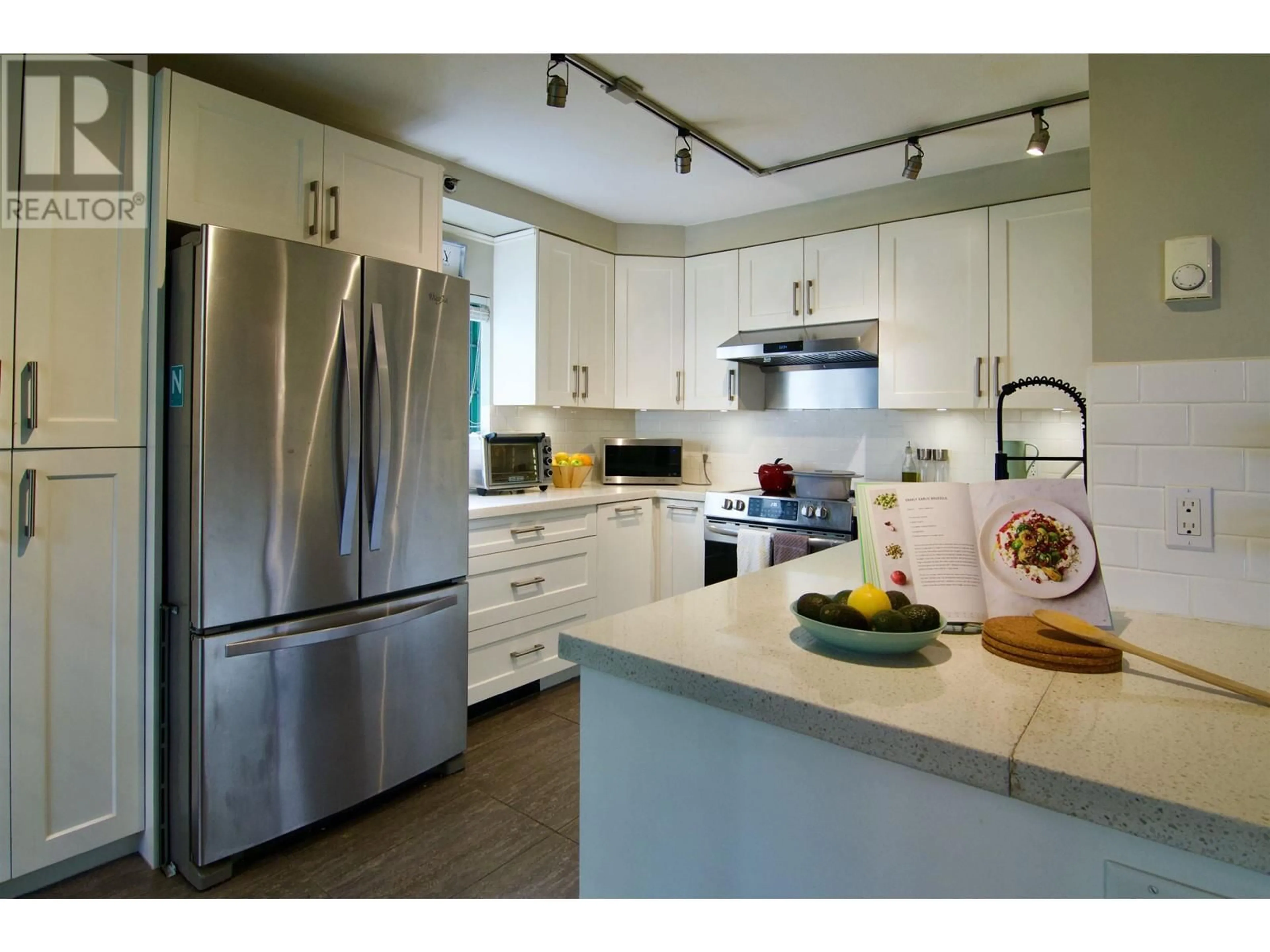 Contemporary kitchen, unknown for 101 - 3055 CAMBIE STREET, Vancouver British Columbia V5Z4N2