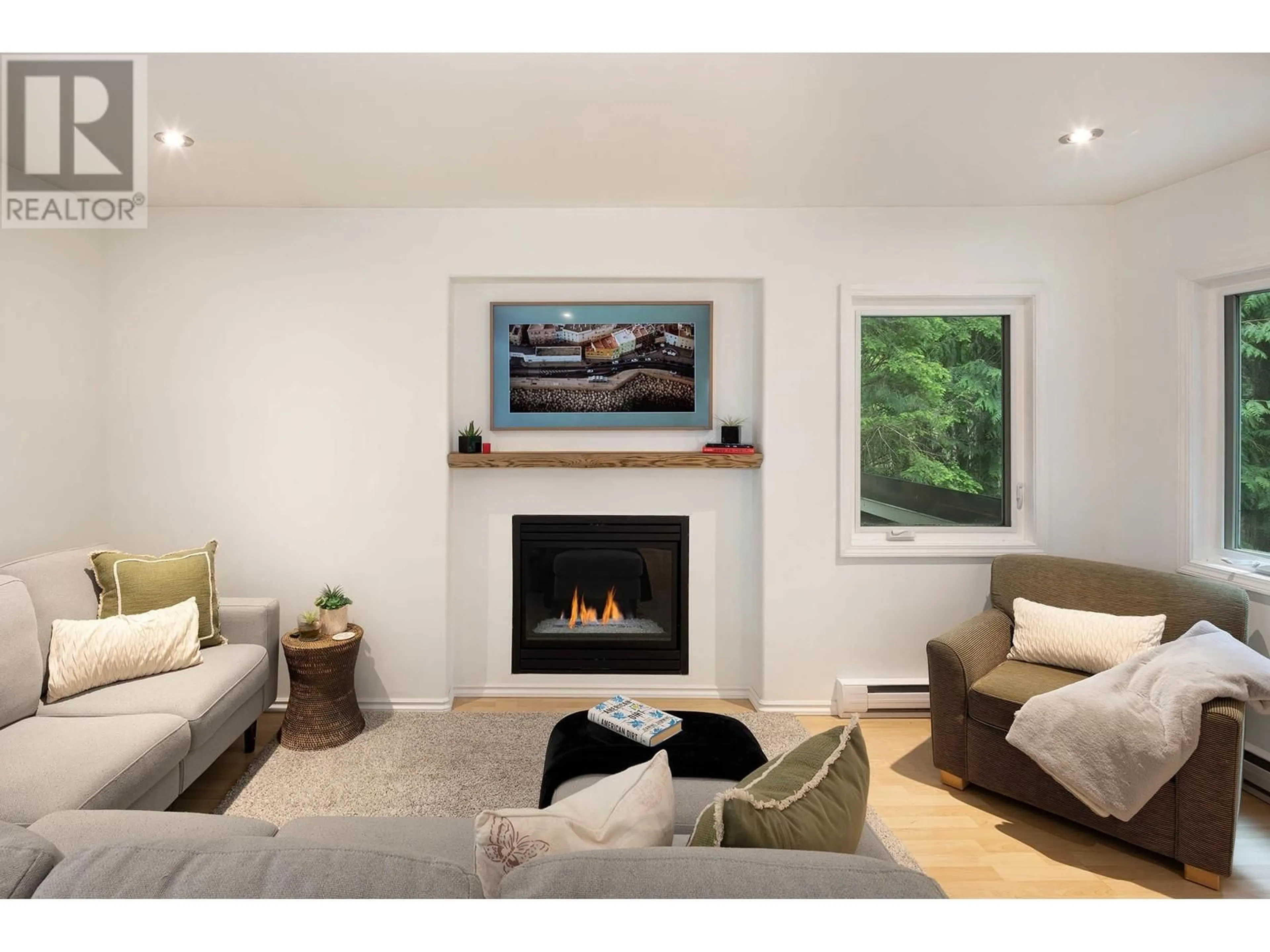 Living room with furniture, wood/laminate floor for 3142 TYROL CRESCENT, Whistler British Columbia V8E0B8