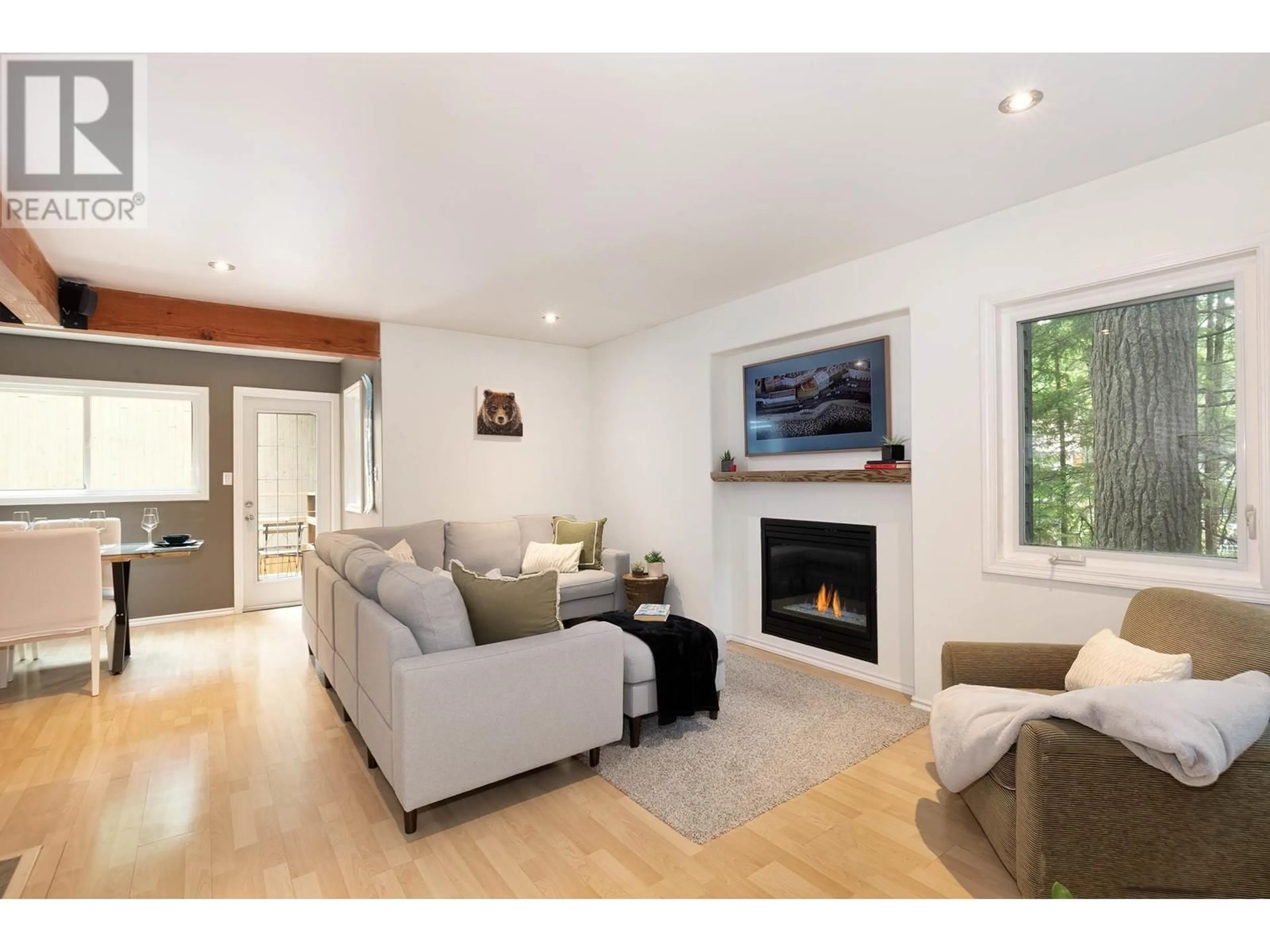 Living room with furniture, wood/laminate floor for 3142 TYROL CRESCENT, Whistler British Columbia V8E0B8