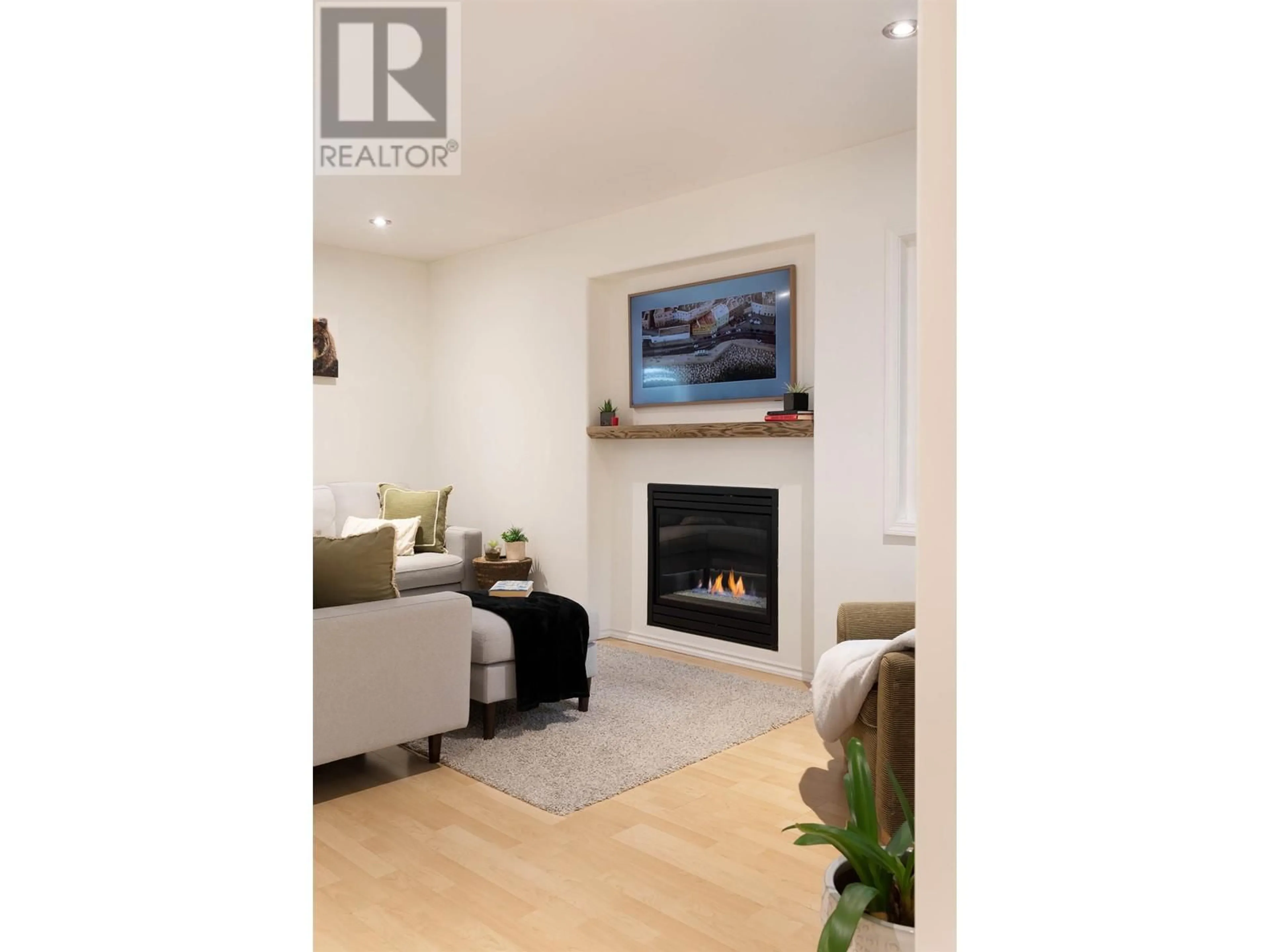 Living room with furniture, wood/laminate floor for 3142 TYROL CRESCENT, Whistler British Columbia V8E0B8