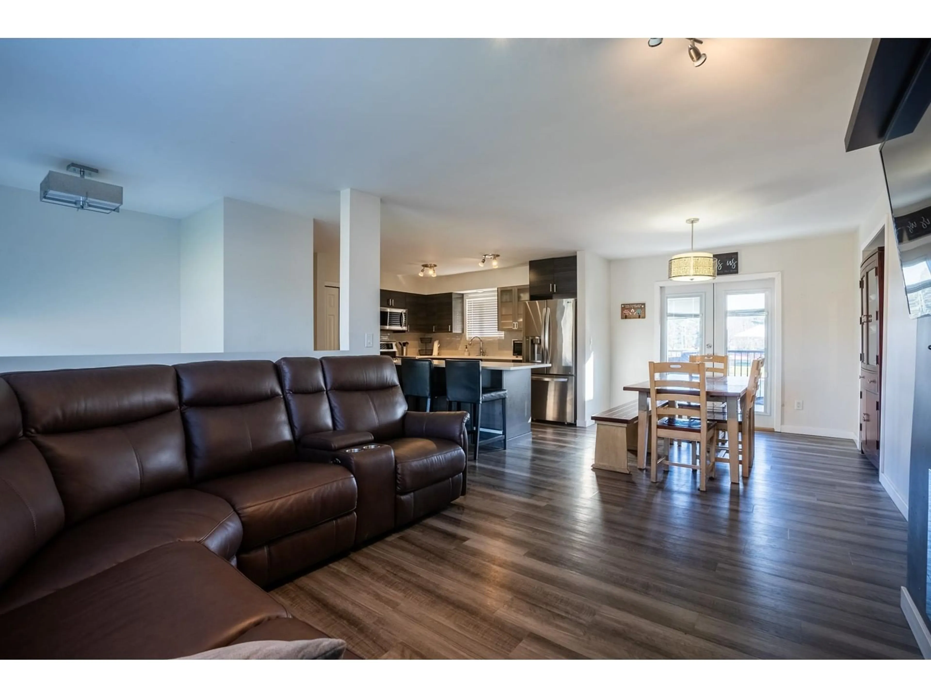 Open concept kitchen, wood/laminate floor for 6266 175B STREET, Surrey British Columbia V3S5Z4