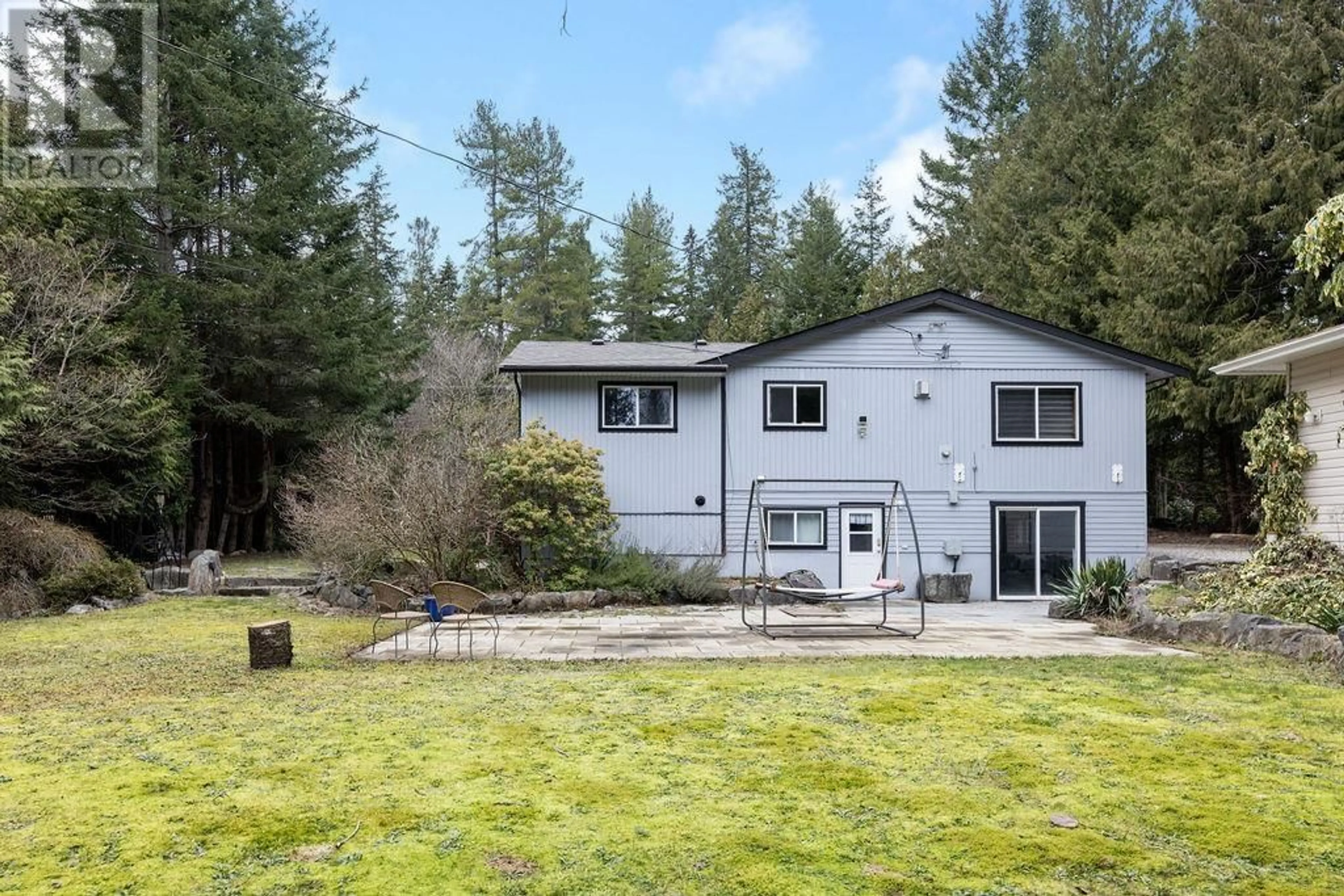 A pic from outside/outdoor area/front of a property/back of a property/a pic from drone, forest/trees view for 8099 NORTHWOOD ROAD, Halfmoon Bay British Columbia V7Z1A8