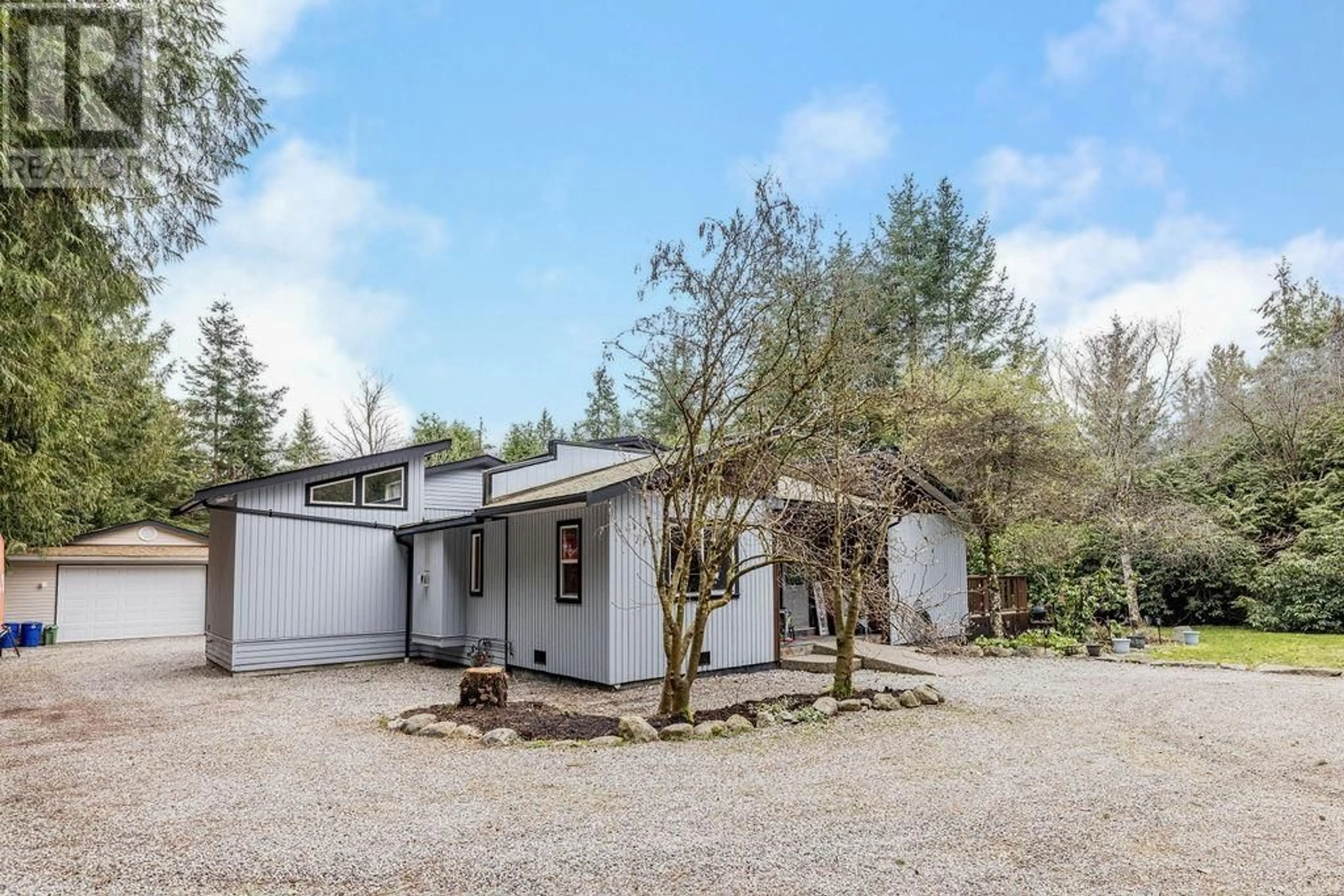 A pic from outside/outdoor area/front of a property/back of a property/a pic from drone, street for 8099 NORTHWOOD ROAD, Halfmoon Bay British Columbia V7Z1A8