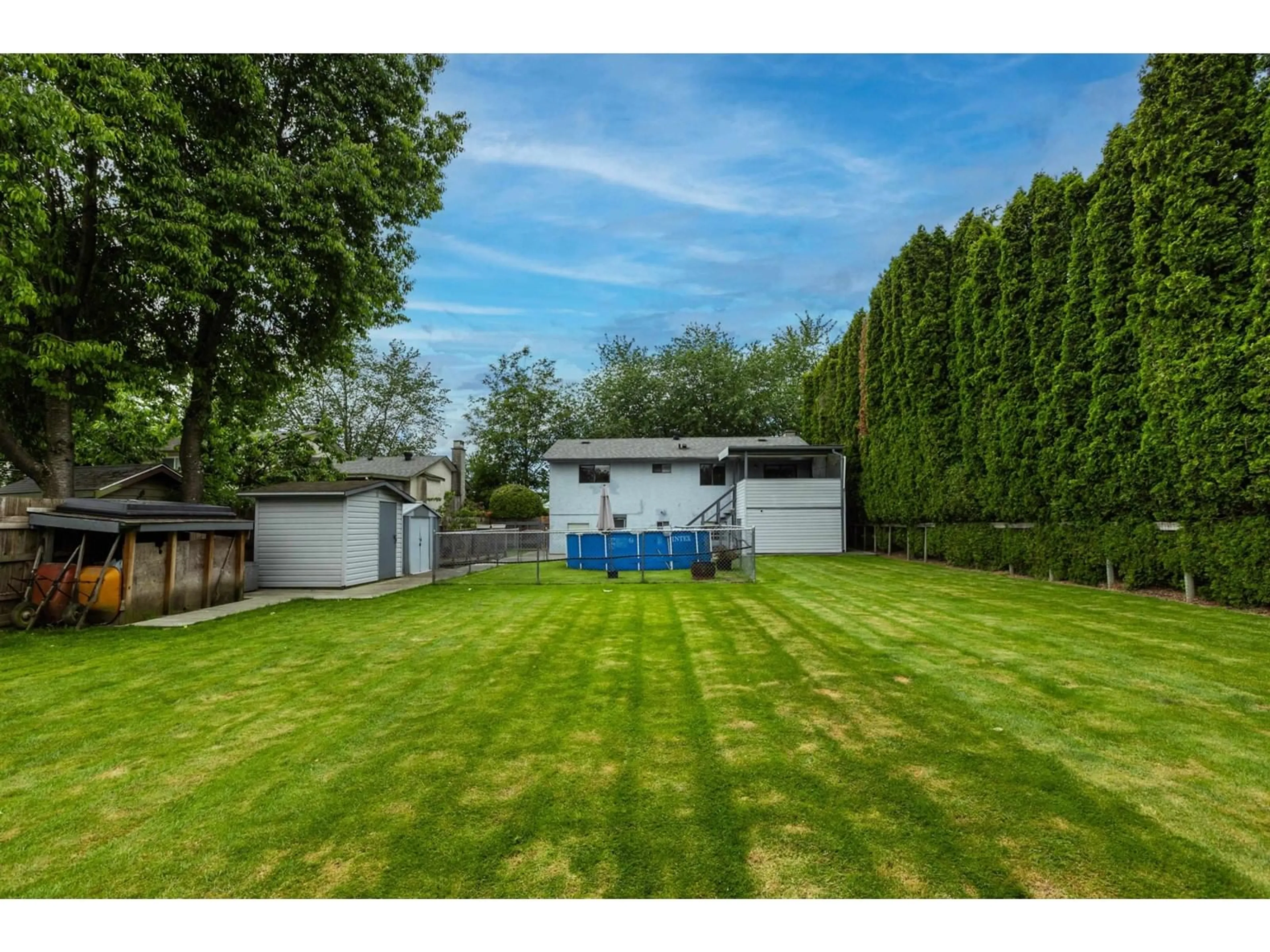 A pic from outside/outdoor area/front of a property/back of a property/a pic from drone, unknown for 8942 139A, Surrey British Columbia V3V7G5