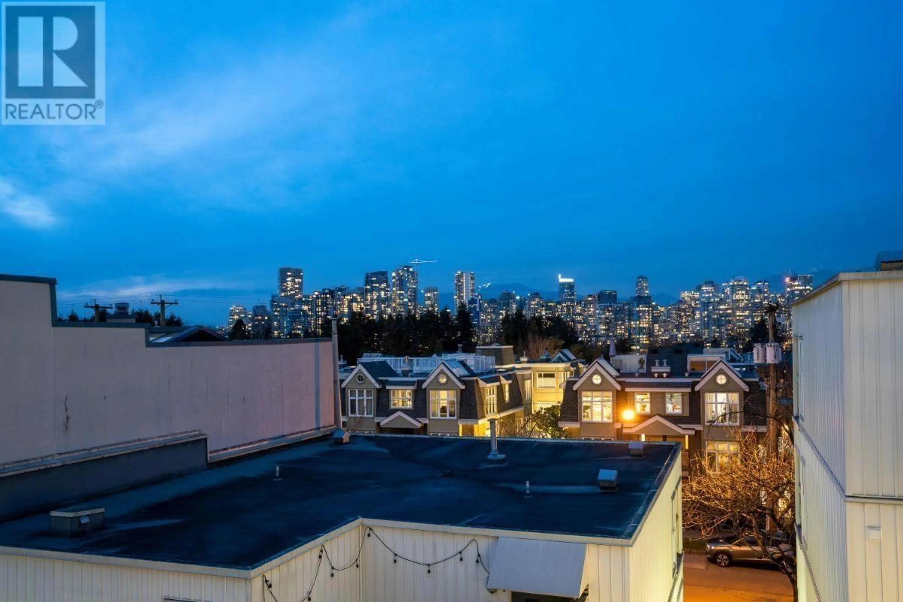 Patio, city buildings view from balcony for 6 704 W. 7TH AVENUE, Vancouver British Columbia V5Z1B8