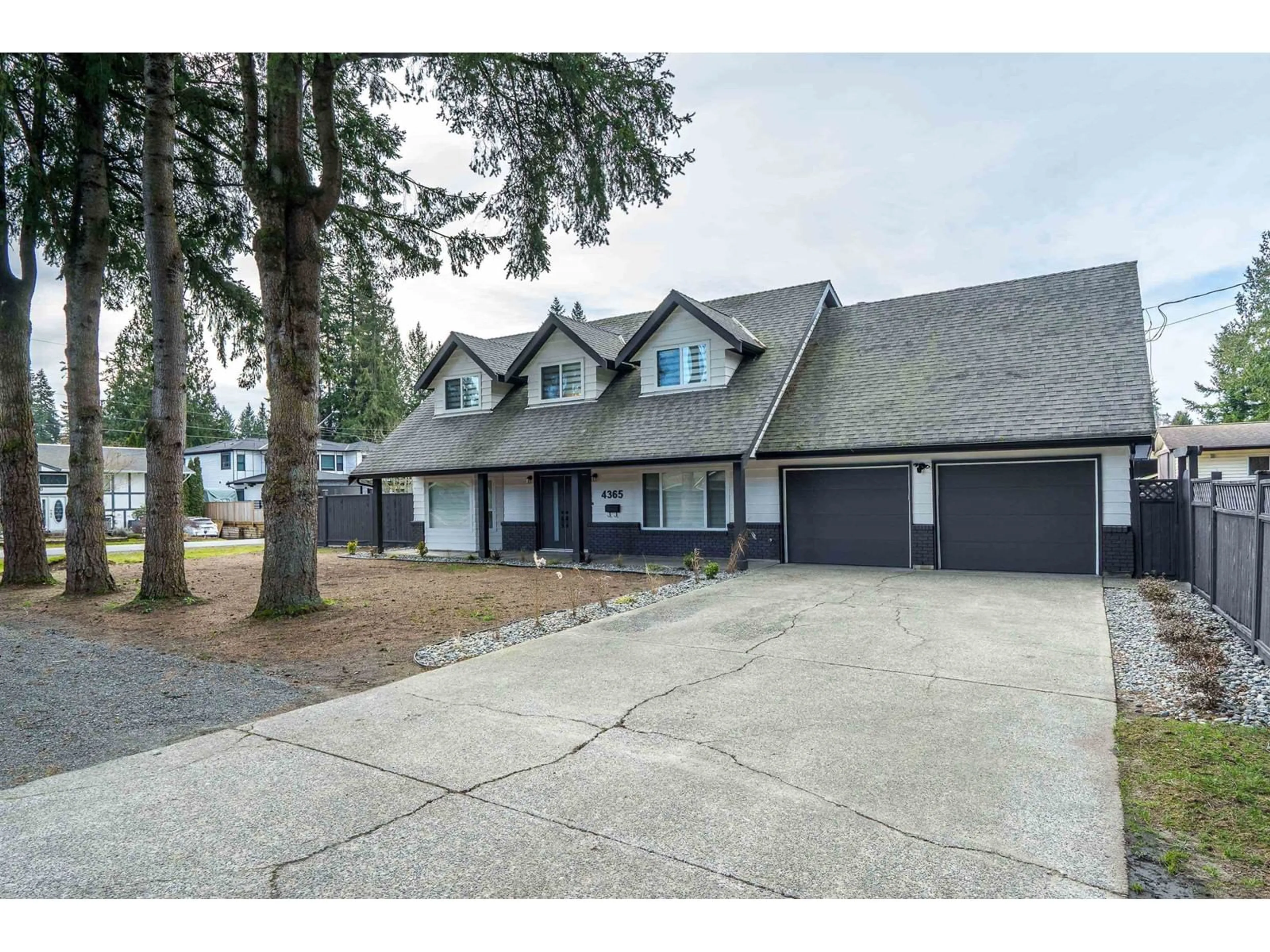 A pic from outside/outdoor area/front of a property/back of a property/a pic from drone, street for 4365 204 STREET, Langley British Columbia V3A1Y9