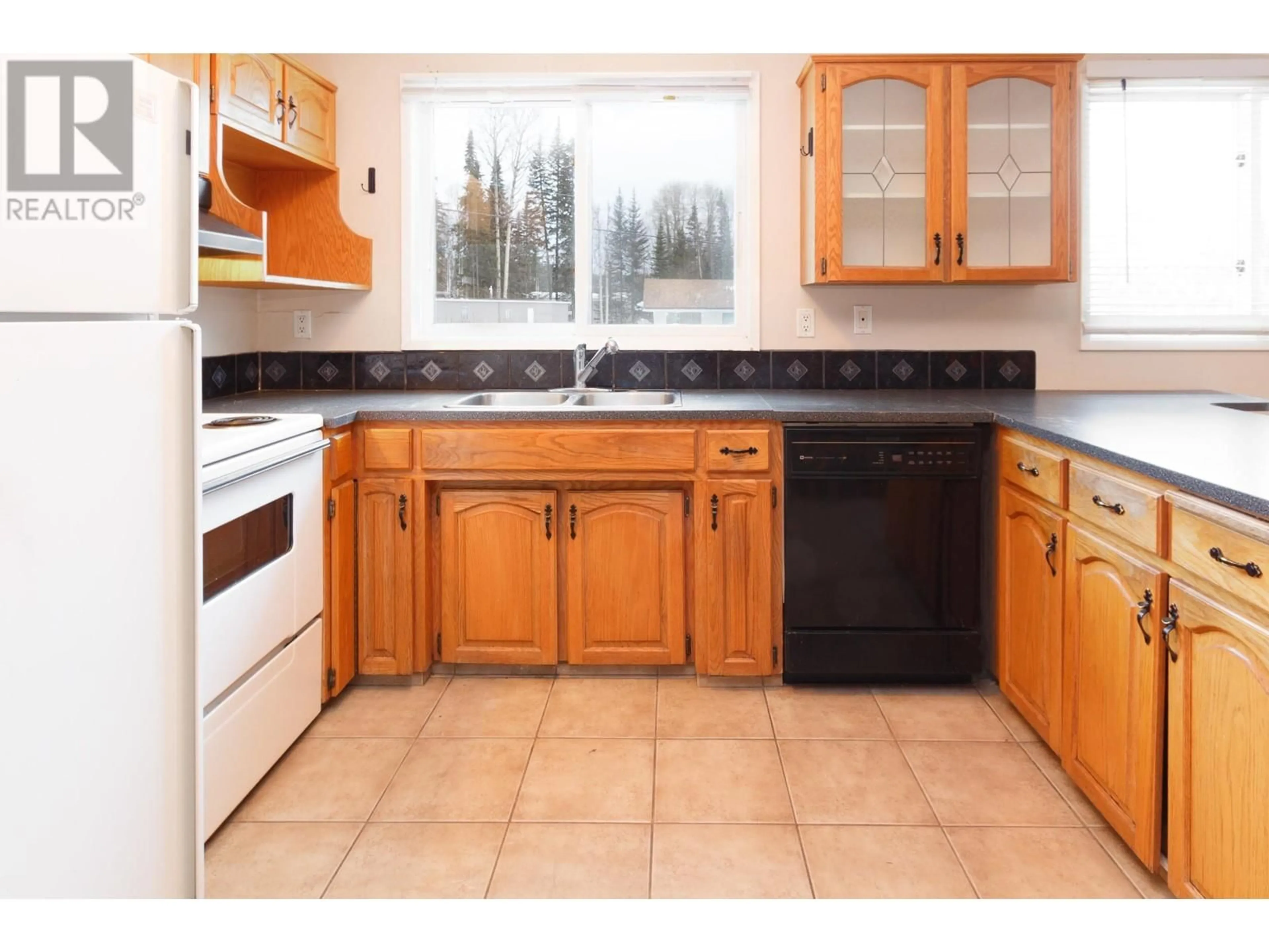 Standard kitchen, ceramic/tile floor for 3687 BALSUM ROAD, Prince George British Columbia V2K1Z8