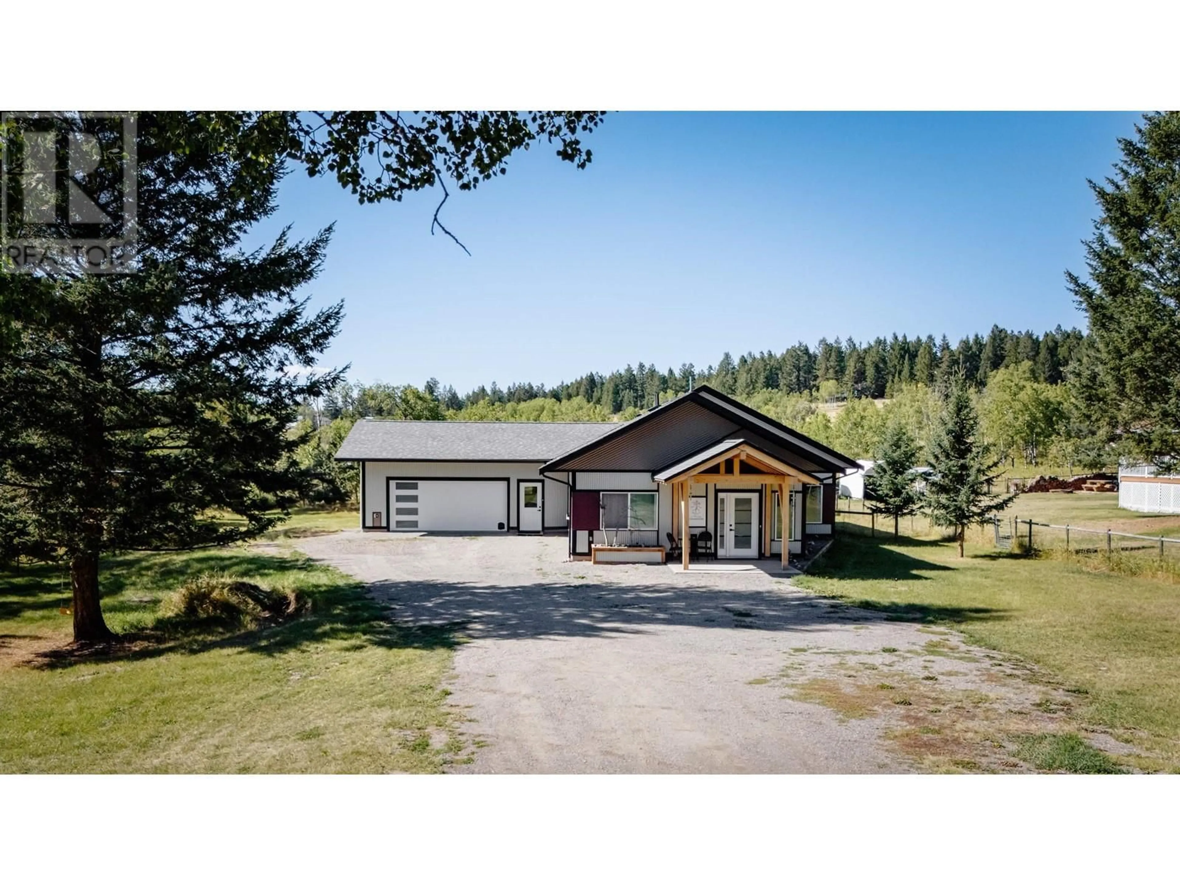 A pic from outside/outdoor area/front of a property/back of a property/a pic from drone, unknown for 5070 KINNCUM PLACE, 108 Mile Ranch British Columbia V0K2Z0