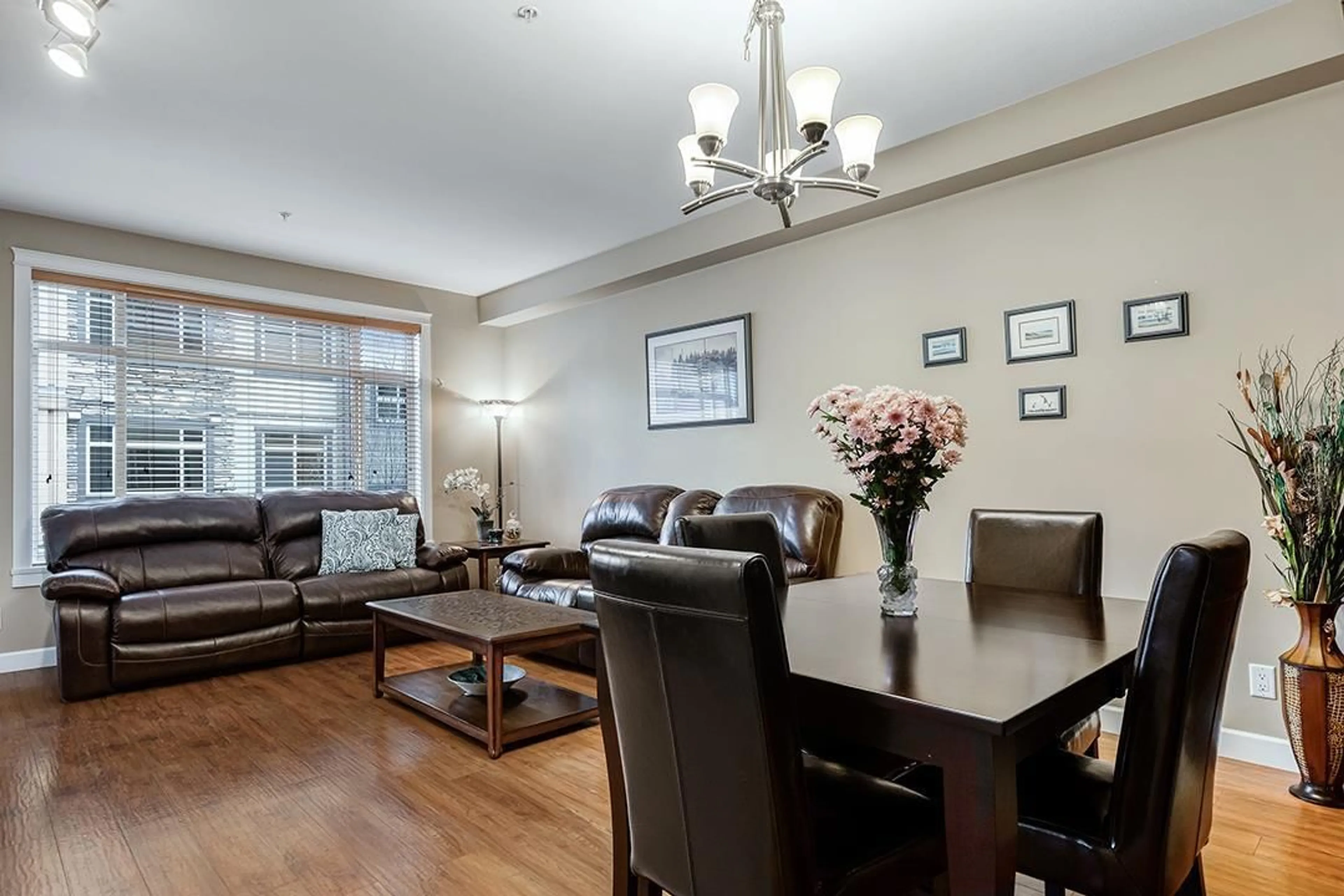 Living room with furniture, wood/laminate floor for 304 8258 207A STREET, Langley British Columbia V2Y0M5