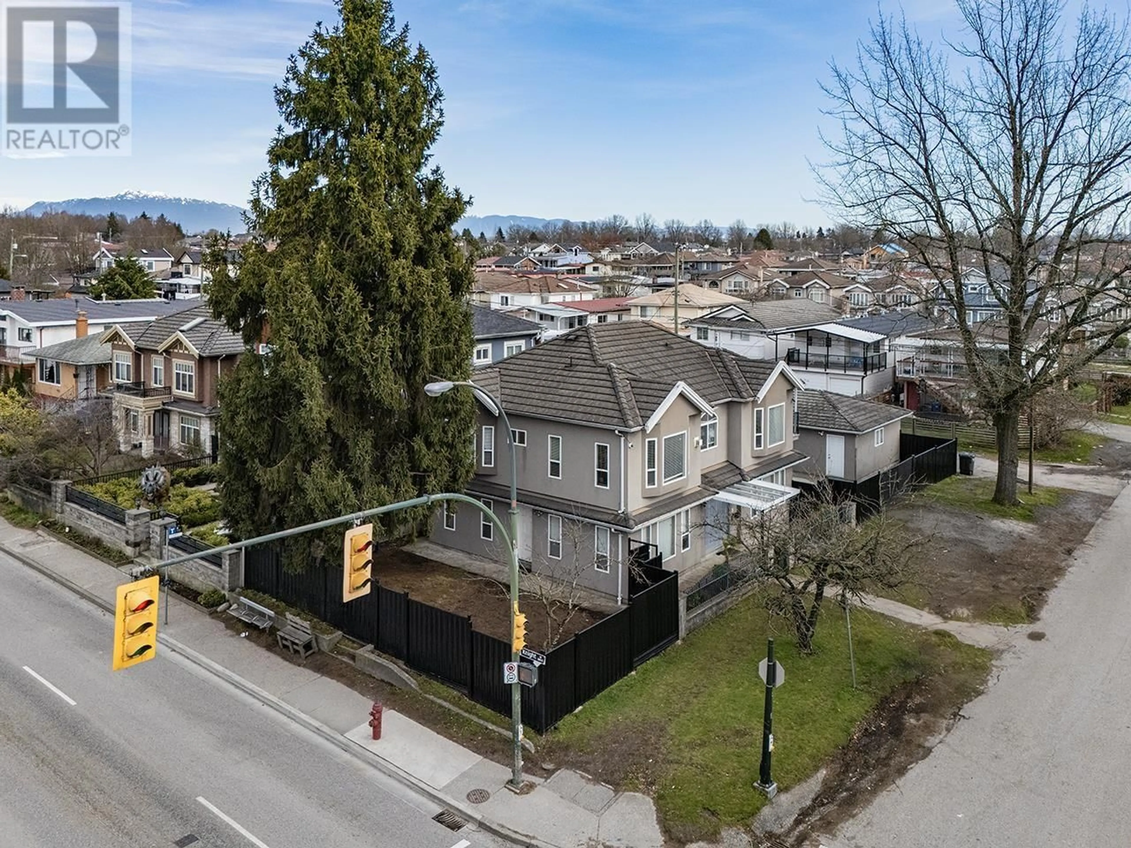 A pic from outside/outdoor area/front of a property/back of a property/a pic from drone, street for 1403 E 53RD AVENUE, Vancouver British Columbia V5P4P7