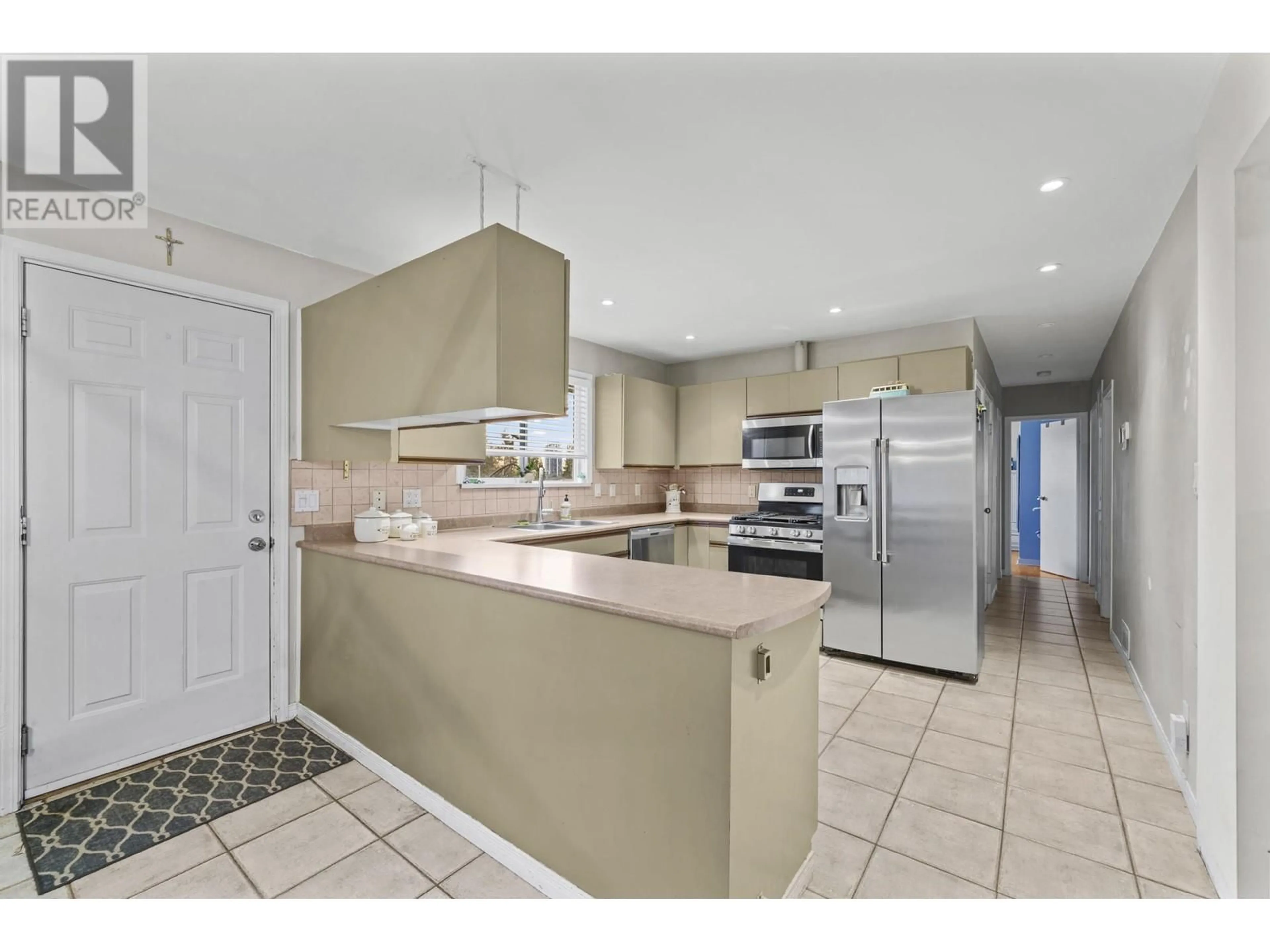 Open concept kitchen, ceramic/tile floor for 1418 FOSTER AVENUE, Coquitlam British Columbia V3J2M9