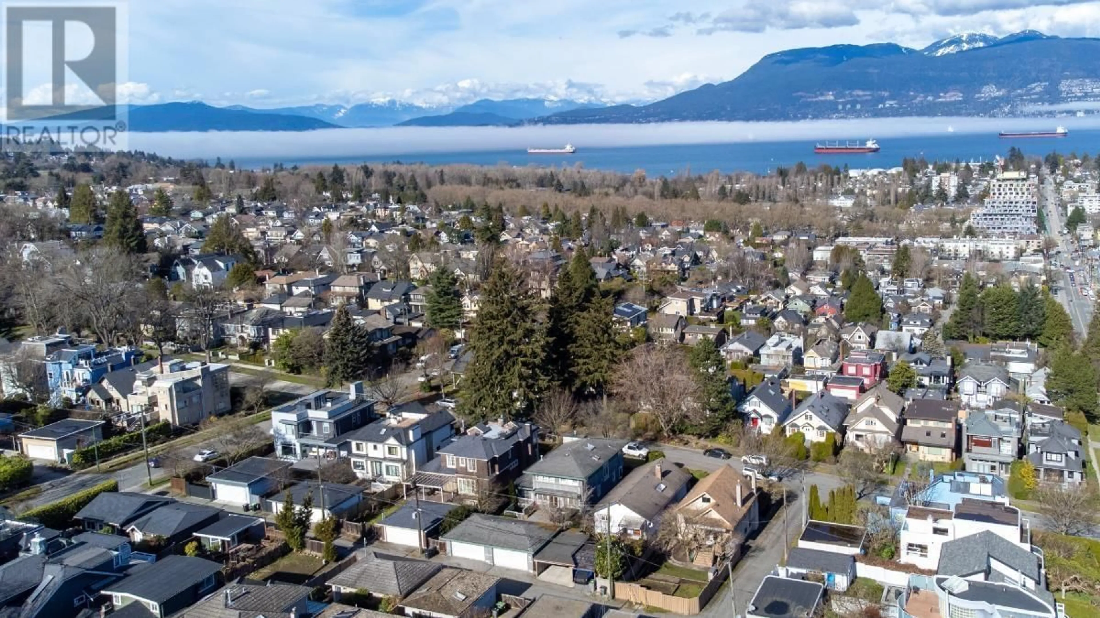 A pic from outside/outdoor area/front of a property/back of a property/a pic from drone, water/lake/river/ocean view for 3716 W 14TH AVENUE, Vancouver British Columbia V6R2W7