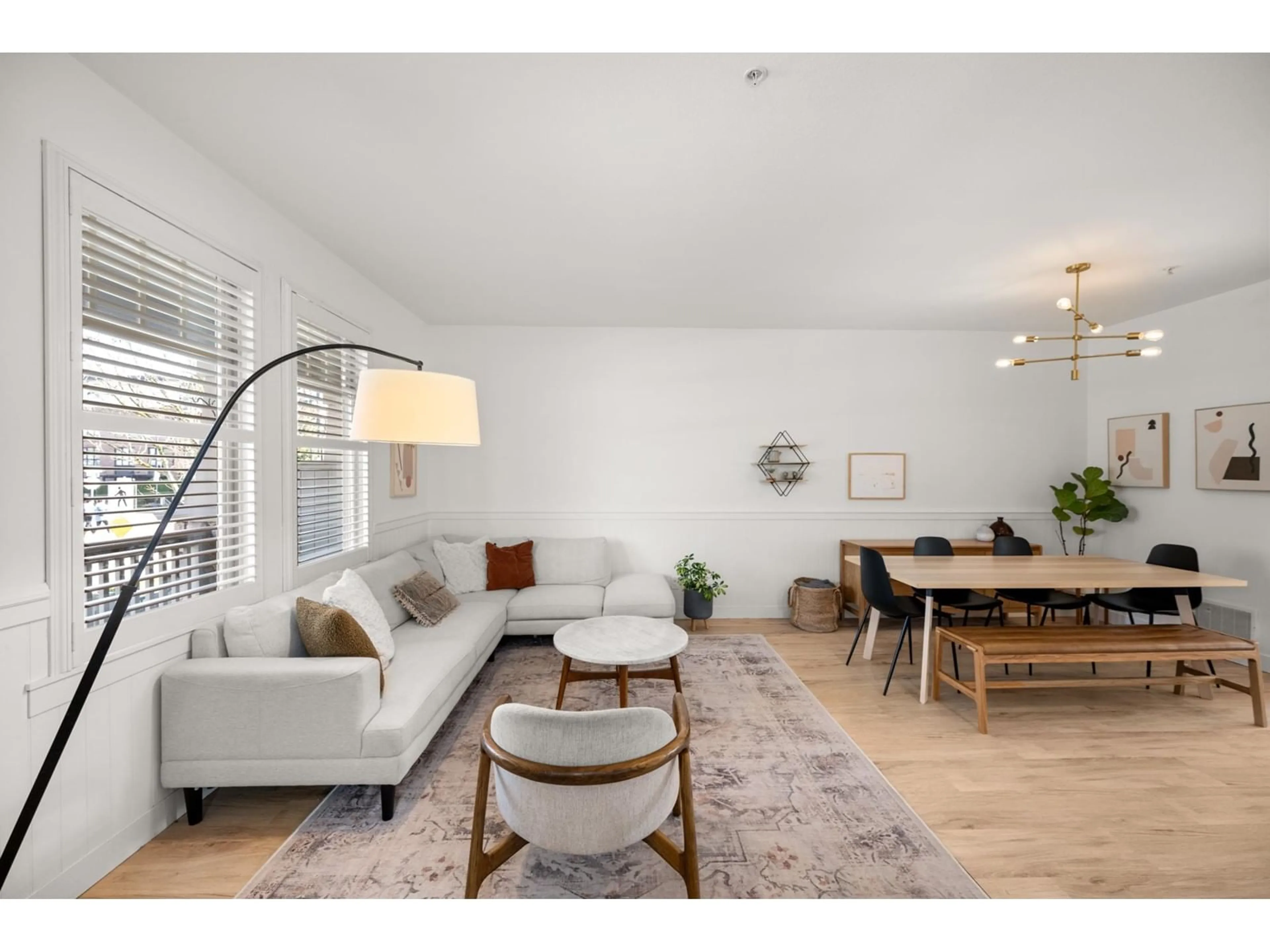 Living room with furniture, wood/laminate floor for 23140 BILLY BROWN ROAD, Langley British Columbia V1M4G1