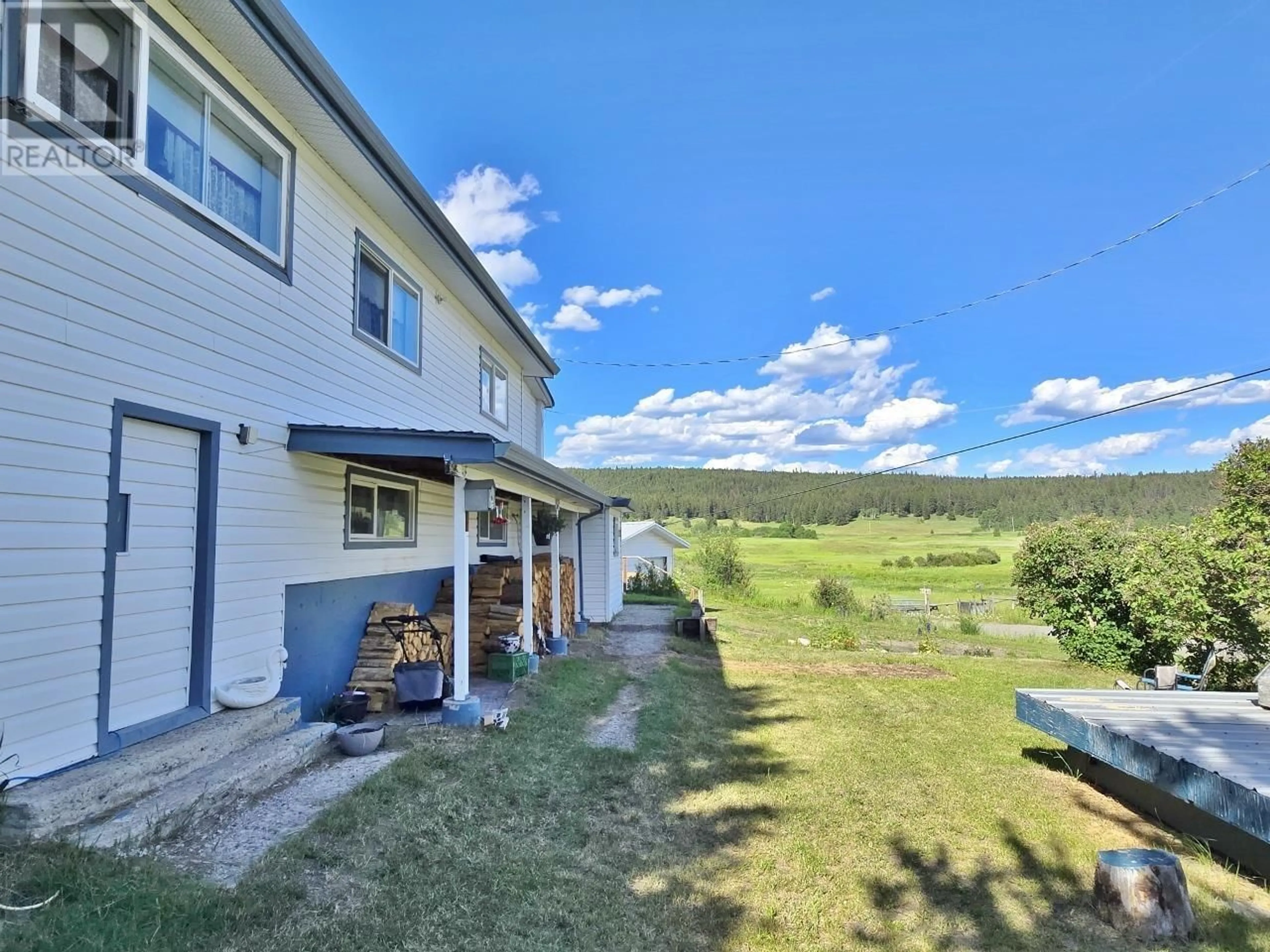 A pic from outside/outdoor area/front of a property/back of a property/a pic from drone, mountain view for 2752 ENTERPRISE ROAD, 150 Mile House British Columbia V0K1T1