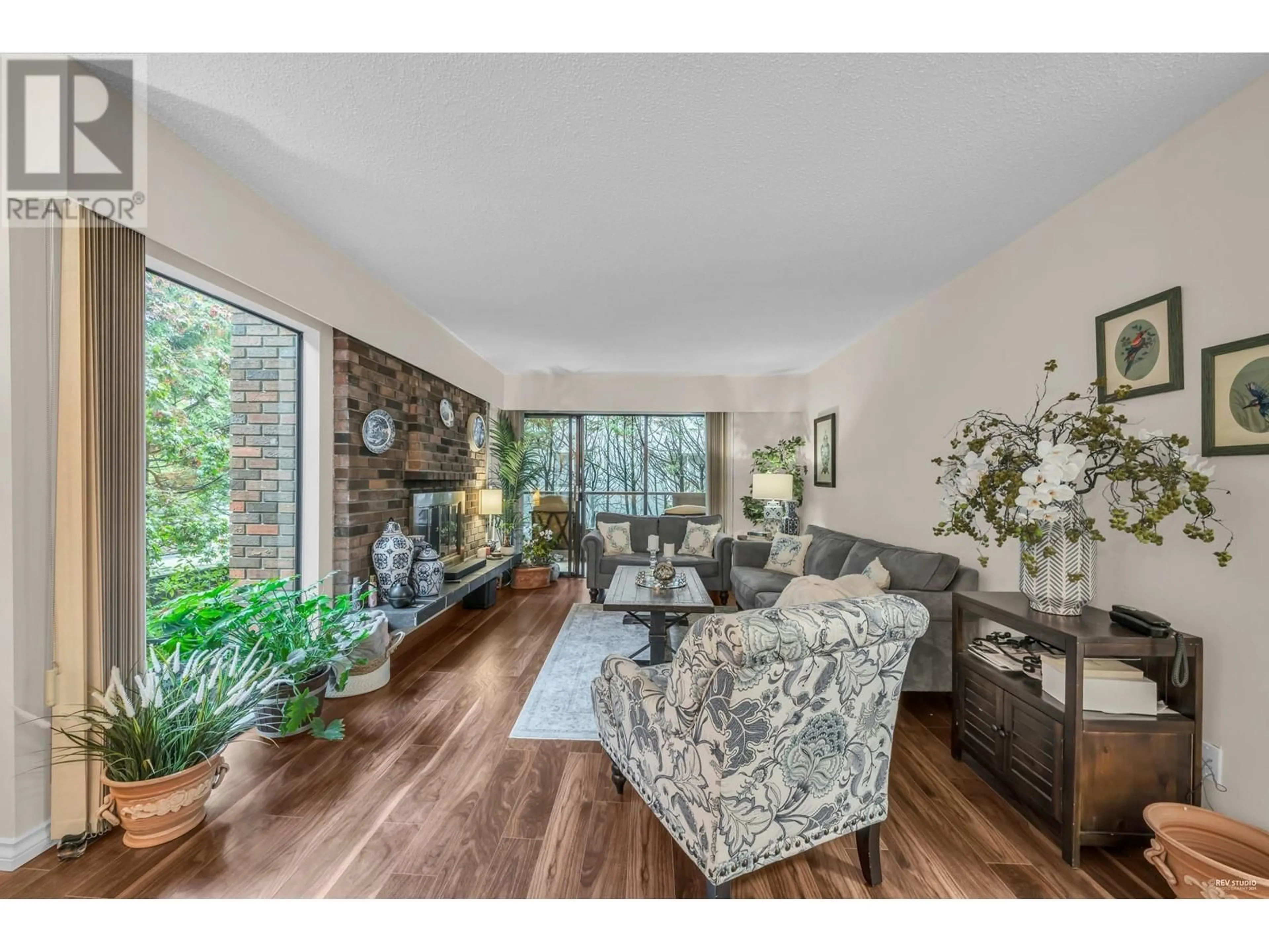 Living room with furniture, wood/laminate floor for 204 2275 W 40TH AVENUE, Vancouver British Columbia V6M1W7