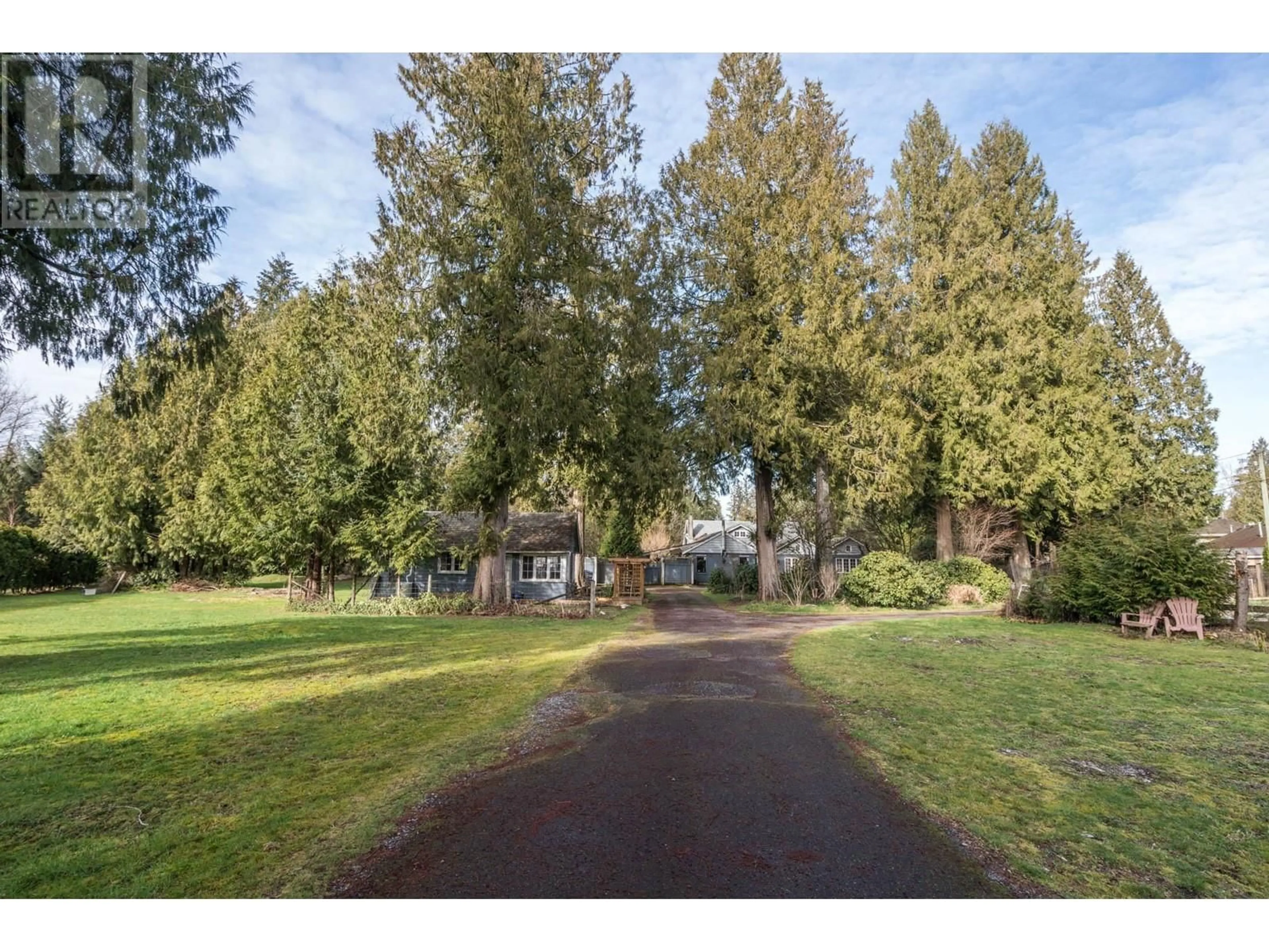 A pic from outside/outdoor area/front of a property/back of a property/a pic from drone, forest/trees view for 12899 230 STREET, Maple Ridge British Columbia V2X0M4