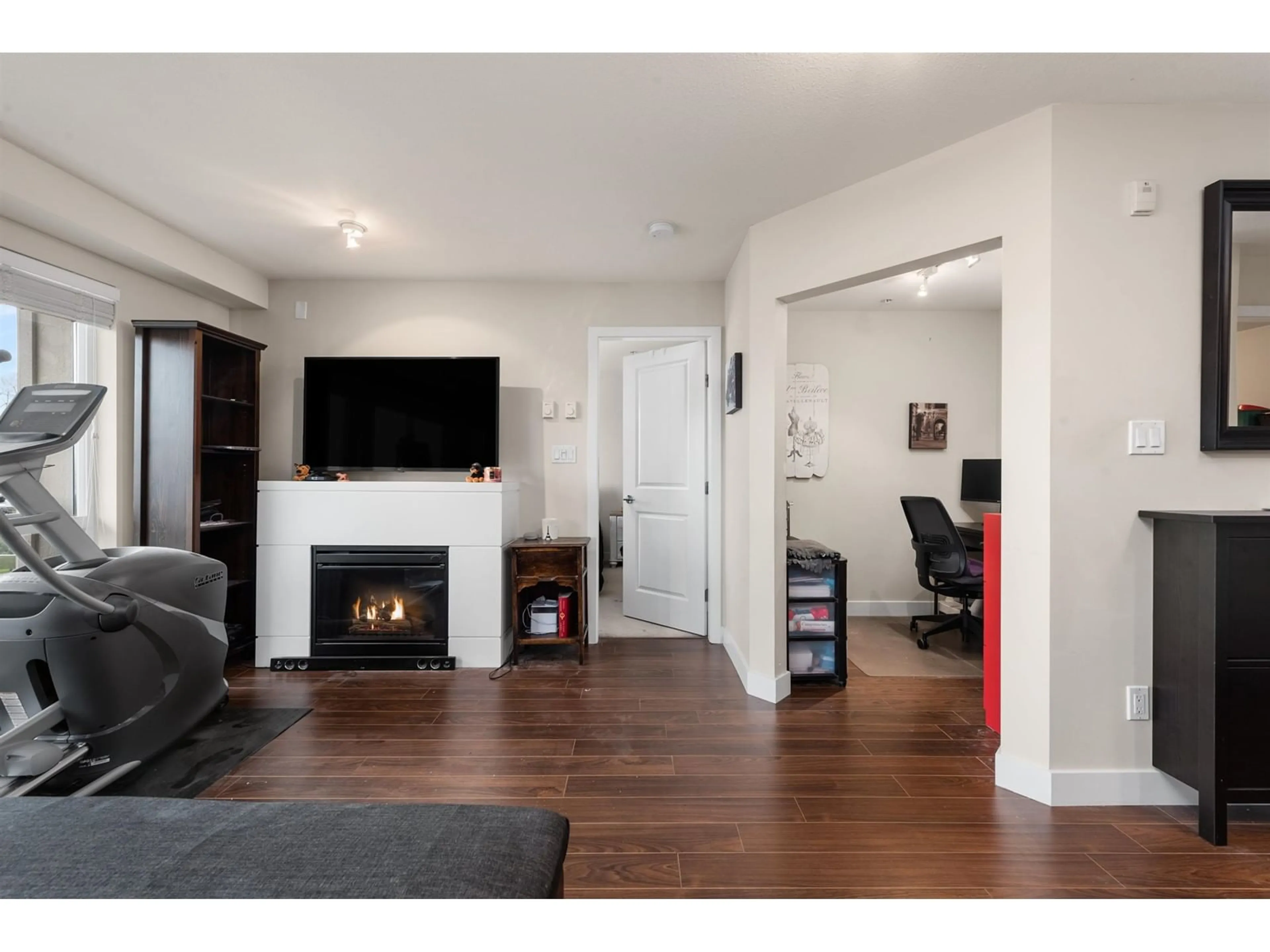 Living room with furniture, wood/laminate floor for 307 15795 CROYDON DRIVE, Surrey British Columbia V3Z2L6