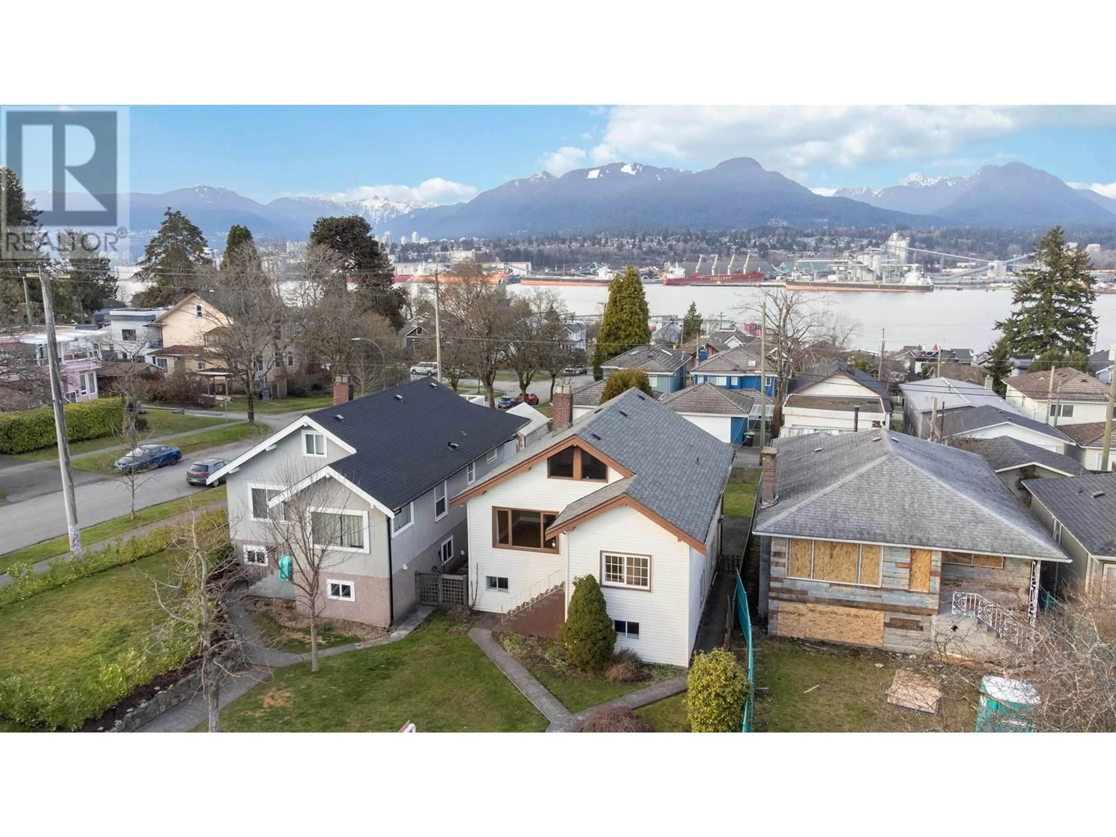 A pic from outside/outdoor area/front of a property/back of a property/a pic from drone, mountain view for 2809 TRINITY STREET, Vancouver British Columbia V5K1E8