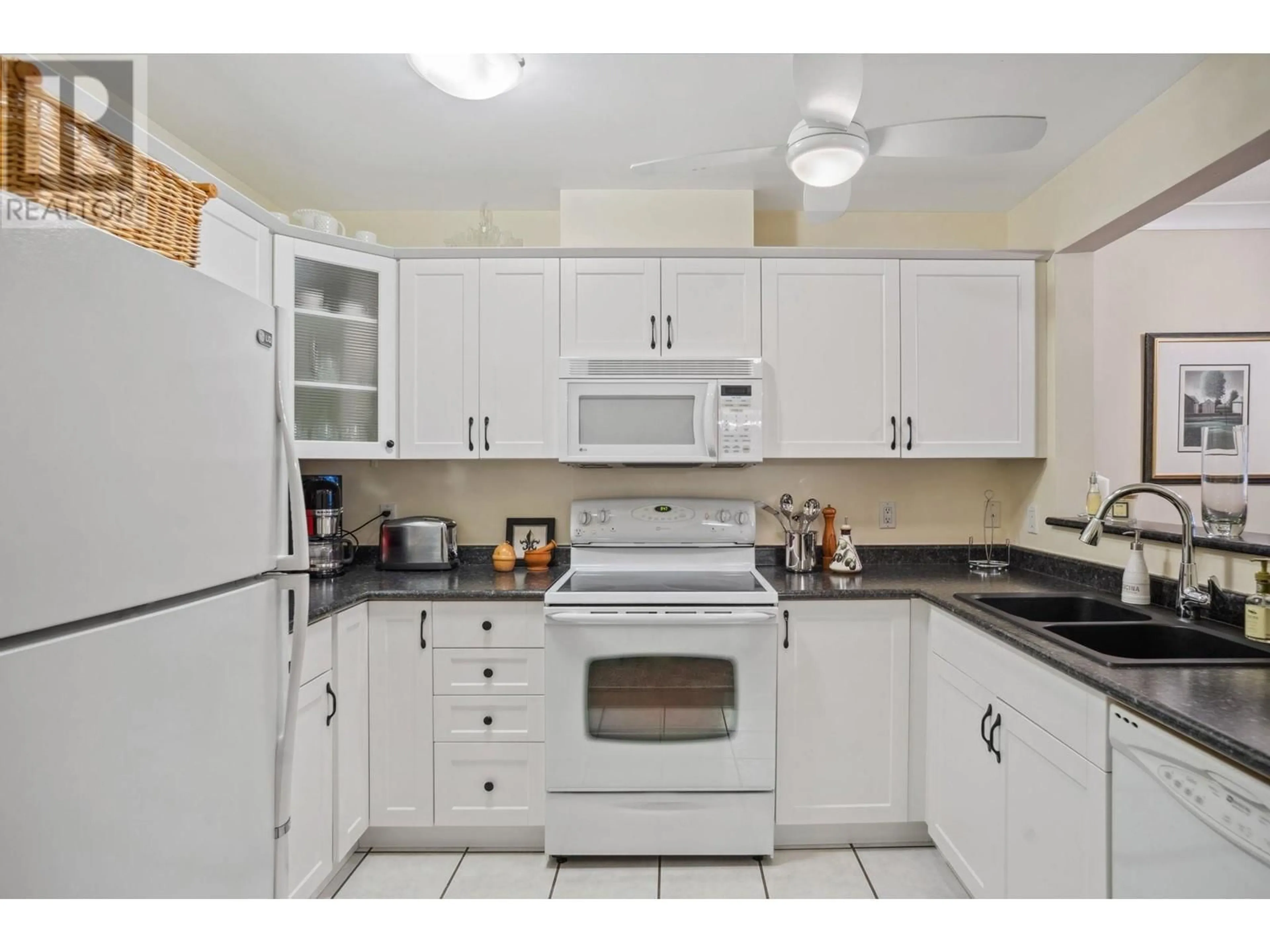 Standard kitchen, ceramic/tile floor for 206 3590 W 26TH AVENUE, Vancouver British Columbia V6S1N9