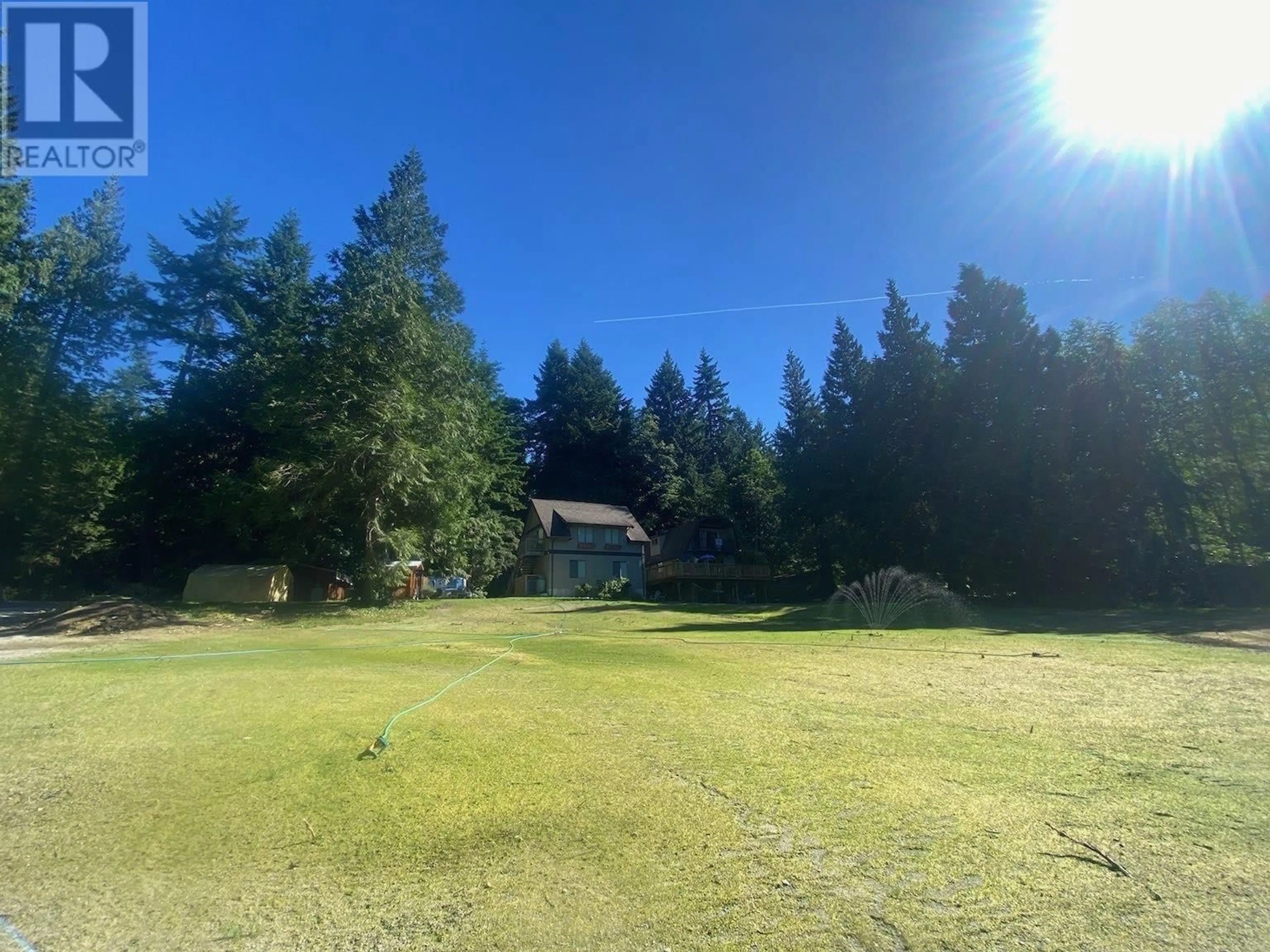 A pic from outside/outdoor area/front of a property/back of a property/a pic from drone, forest/trees view for 2617 SUNSHINE COAST HIGHWAY, Roberts Creek British Columbia V0N2W4