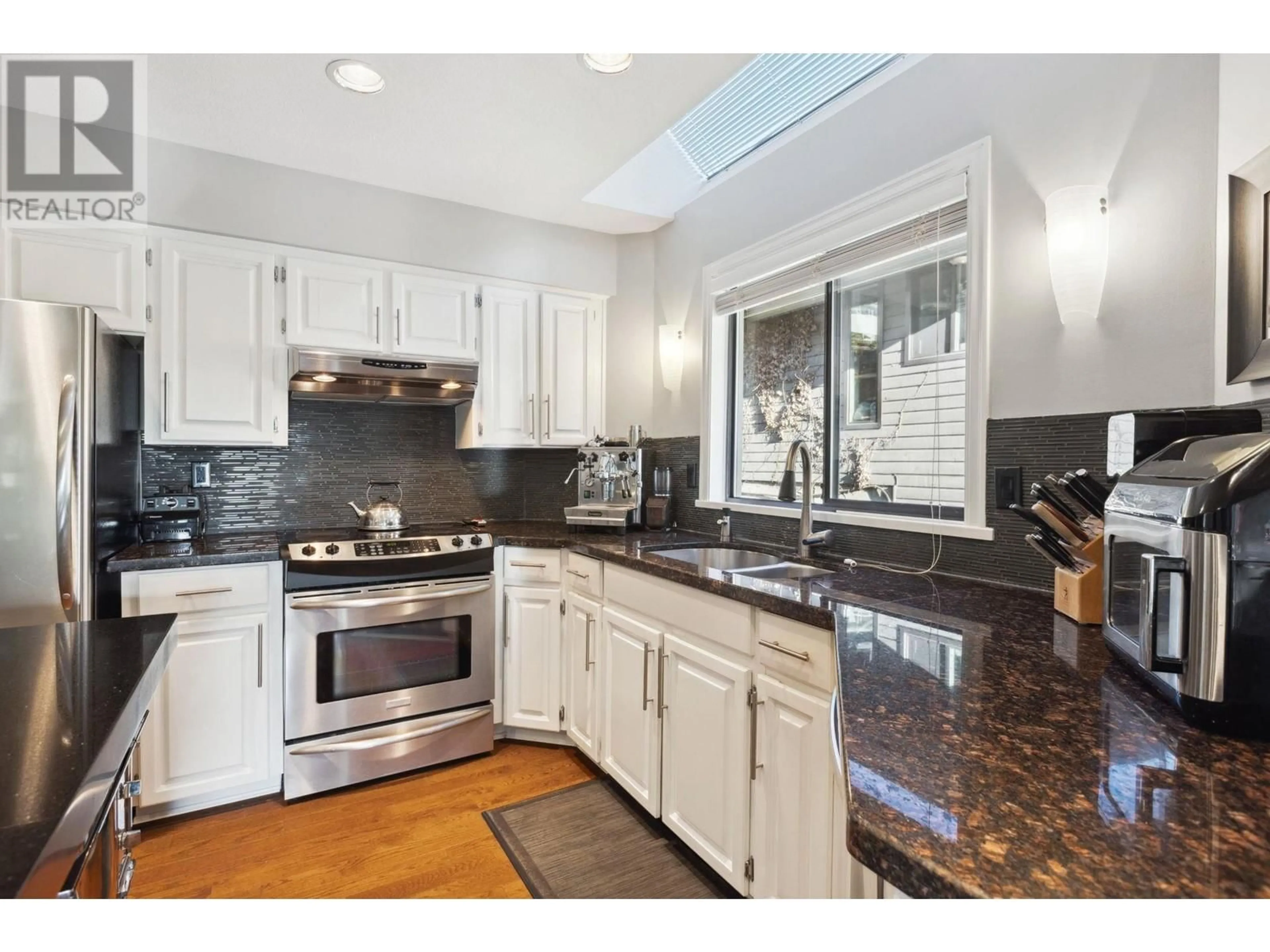 Open concept kitchen, ceramic/tile floor for 4221 ST. PAULS AVENUE, North Vancouver British Columbia V7N1T4