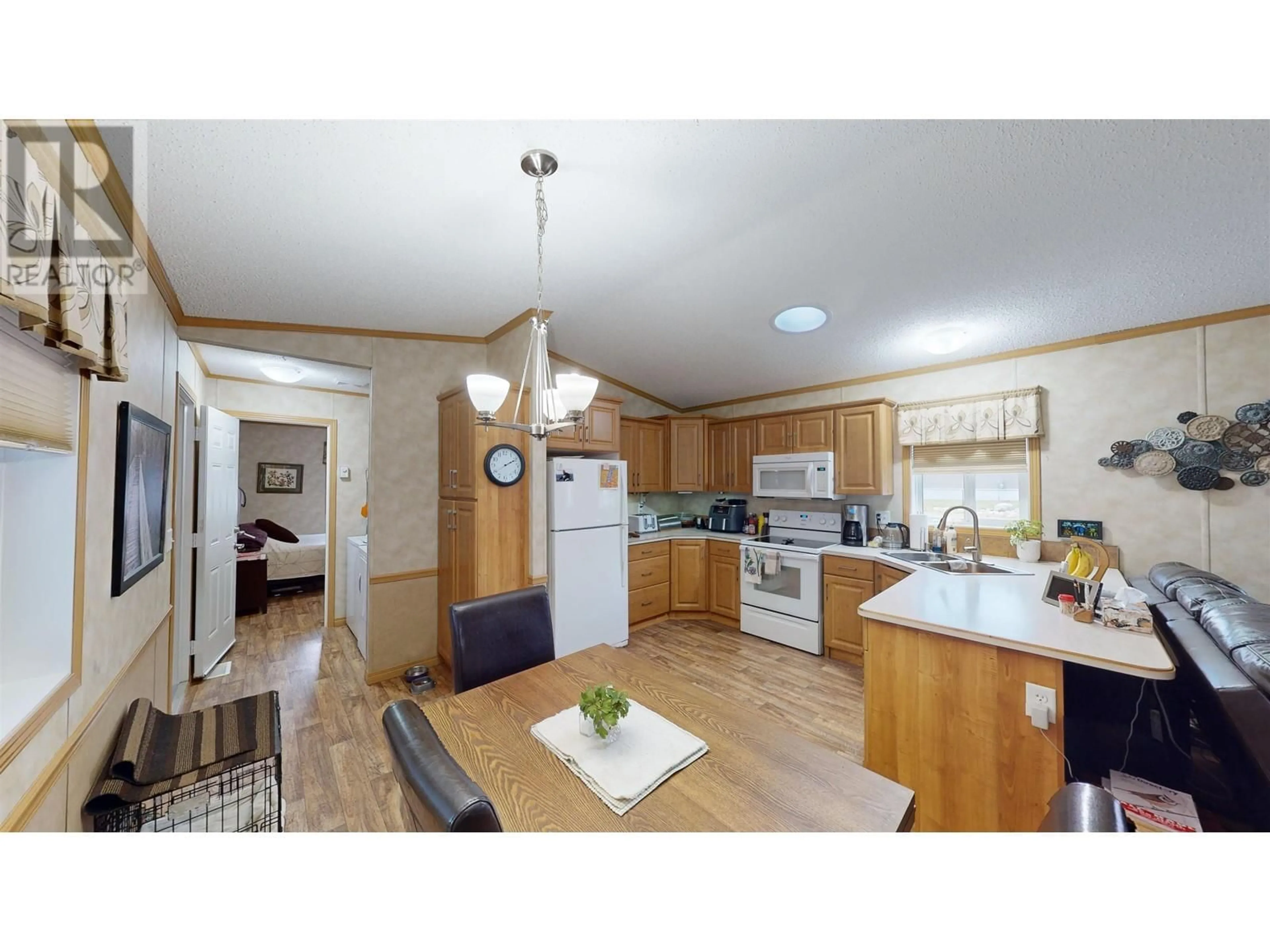 Open concept kitchen, wood/laminate floor for 50 - 380 WESTLAND ROAD, Quesnel British Columbia V2J6A7