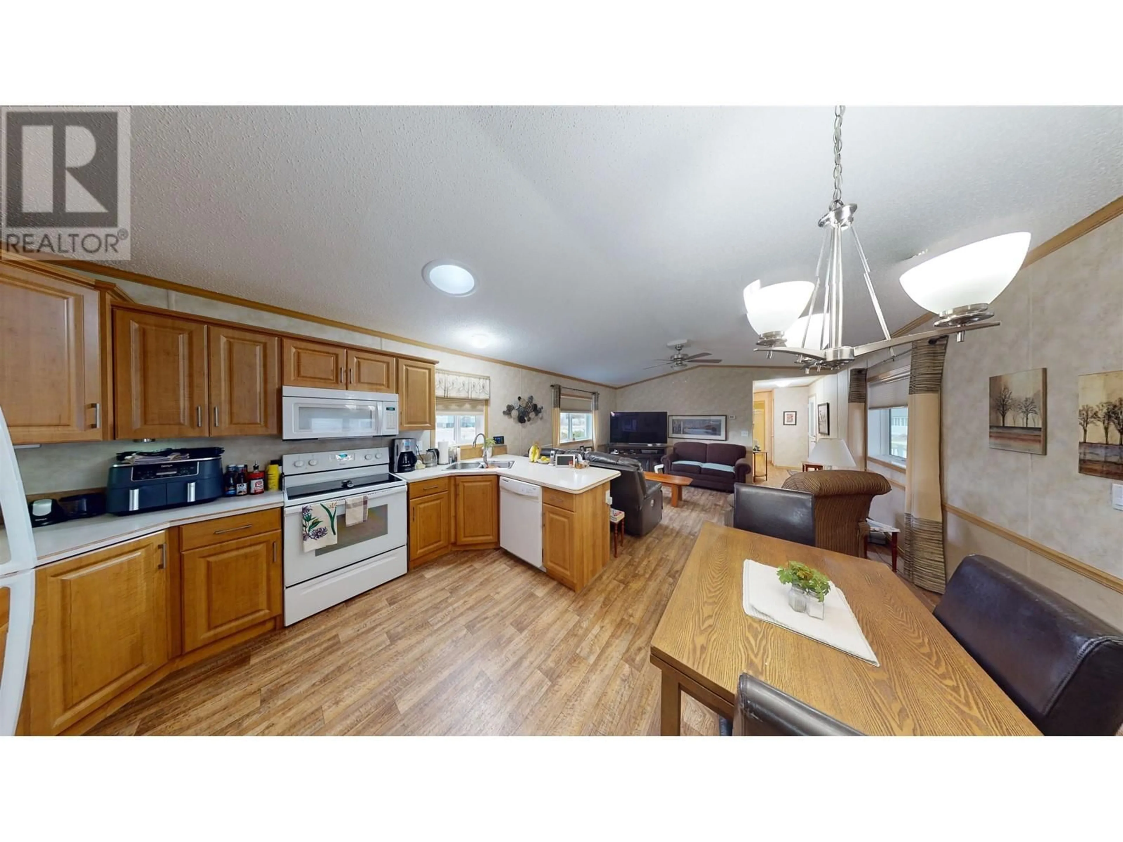 Open concept kitchen, wood/laminate floor for 50 - 380 WESTLAND ROAD, Quesnel British Columbia V2J6A7