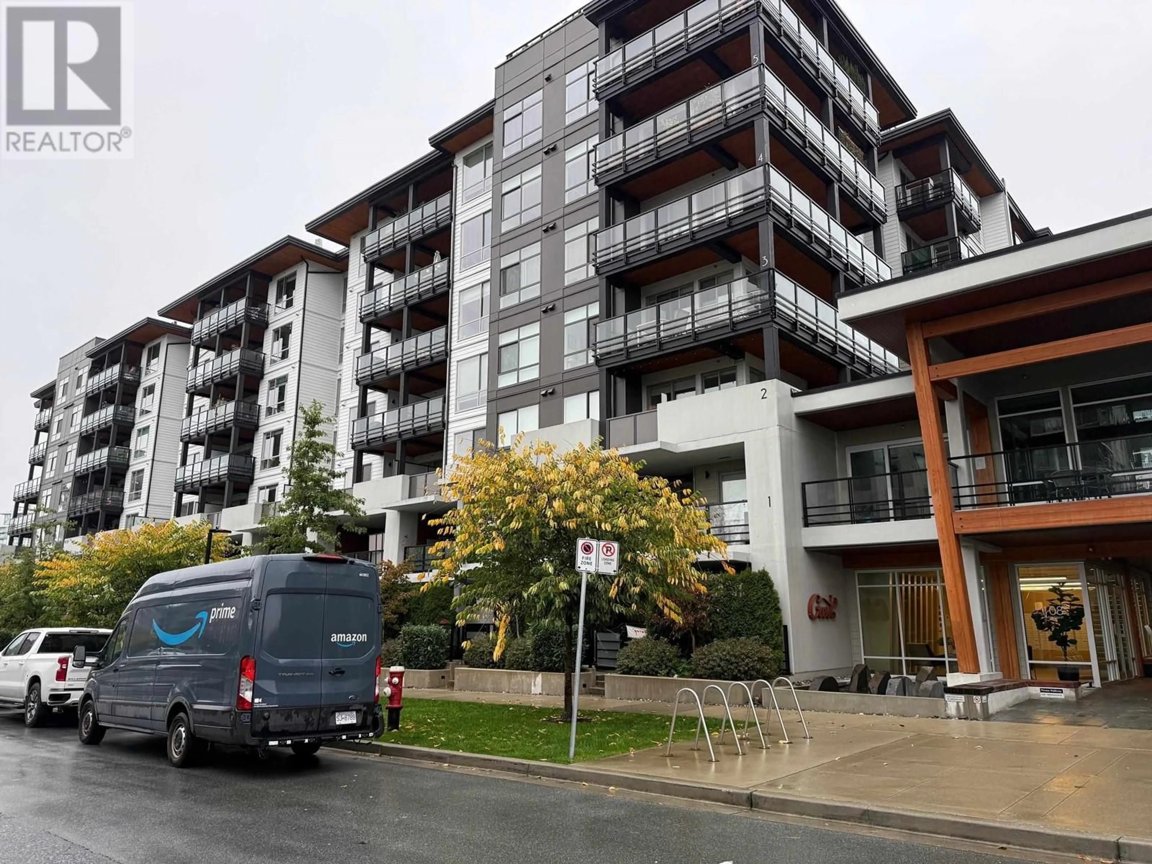 A pic from outside/outdoor area/front of a property/back of a property/a pic from drone, street for 202 - 108 8TH STREET, North Vancouver British Columbia V7L0H1