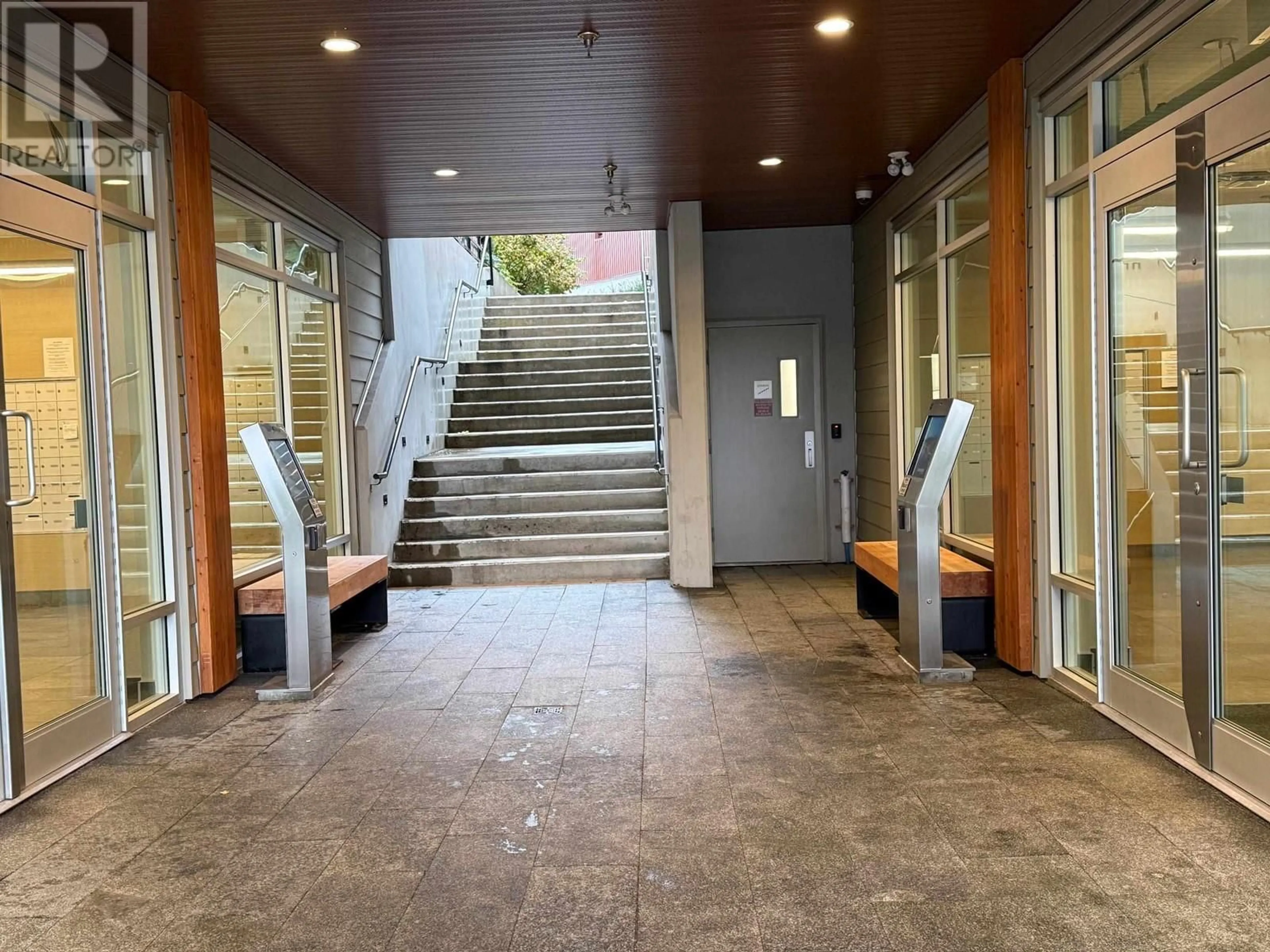 Indoor foyer for 202 - 108 8TH STREET, North Vancouver British Columbia V7L0H1