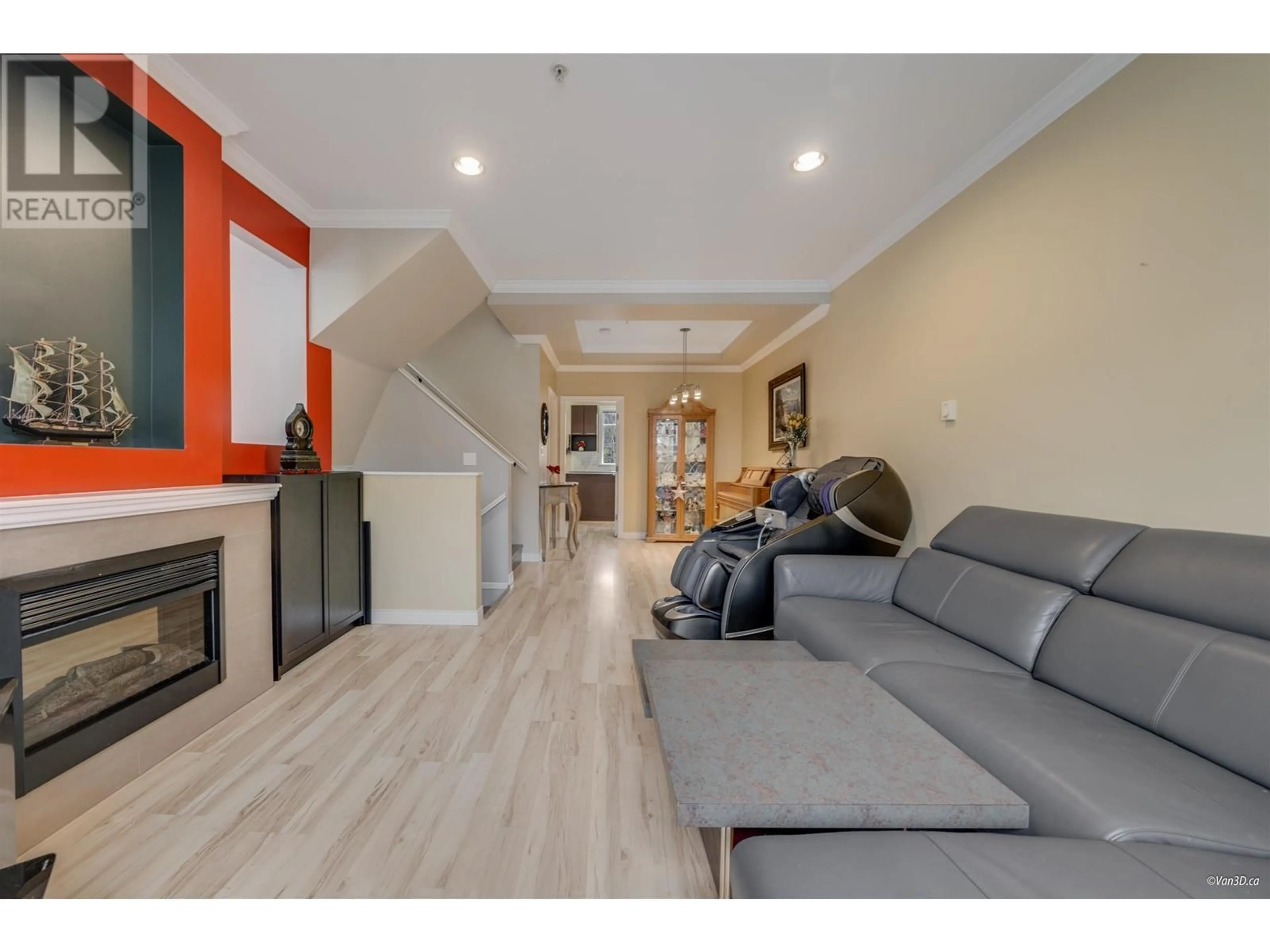 Living room with furniture, wood/laminate floor for 1 2039 CLARKE STREET, Port Moody British Columbia V3H1Y3