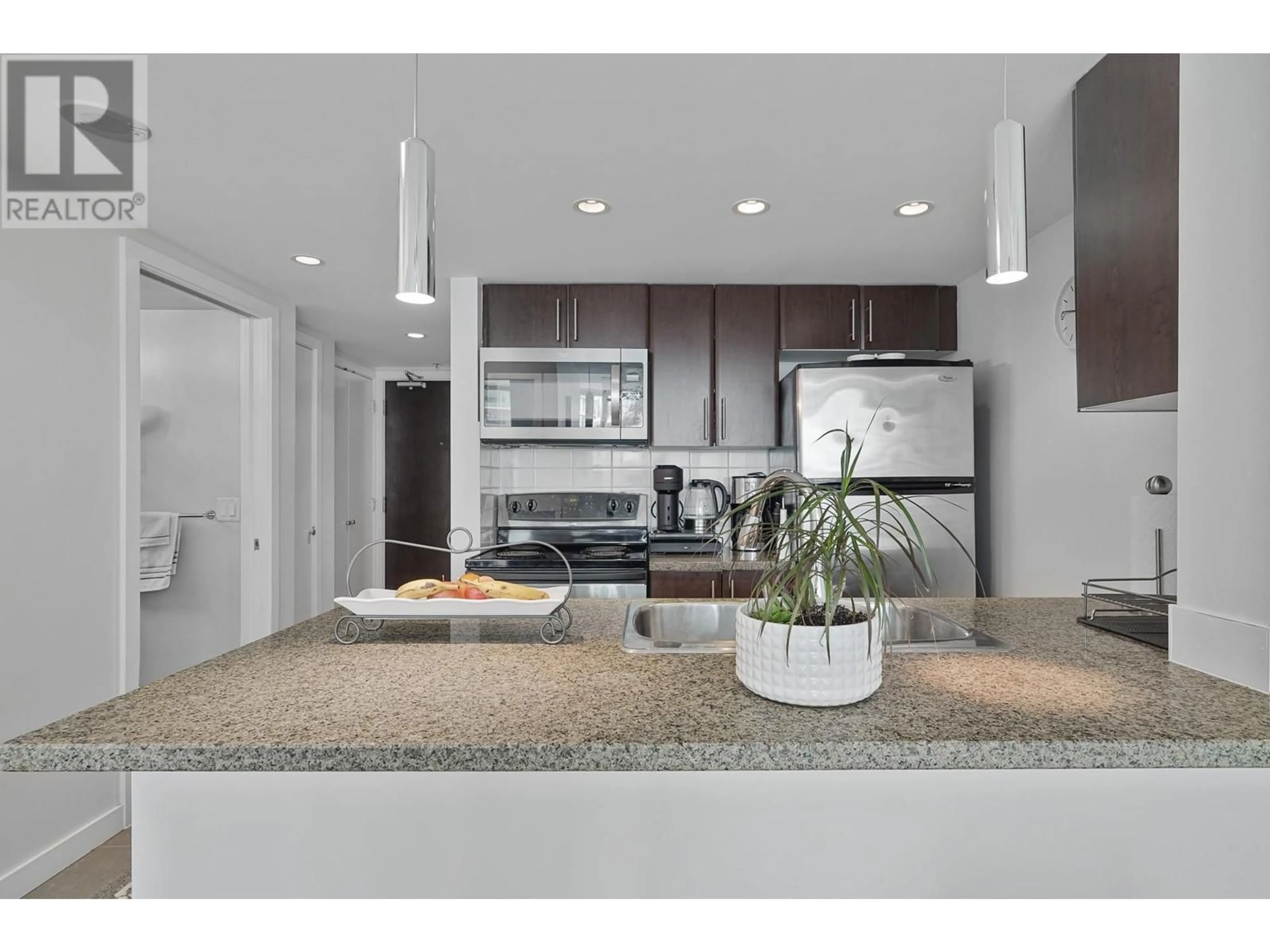 Open concept kitchen, ceramic/tile floor for 1503 58 KEEFER PLACE, Vancouver British Columbia V6B0B8