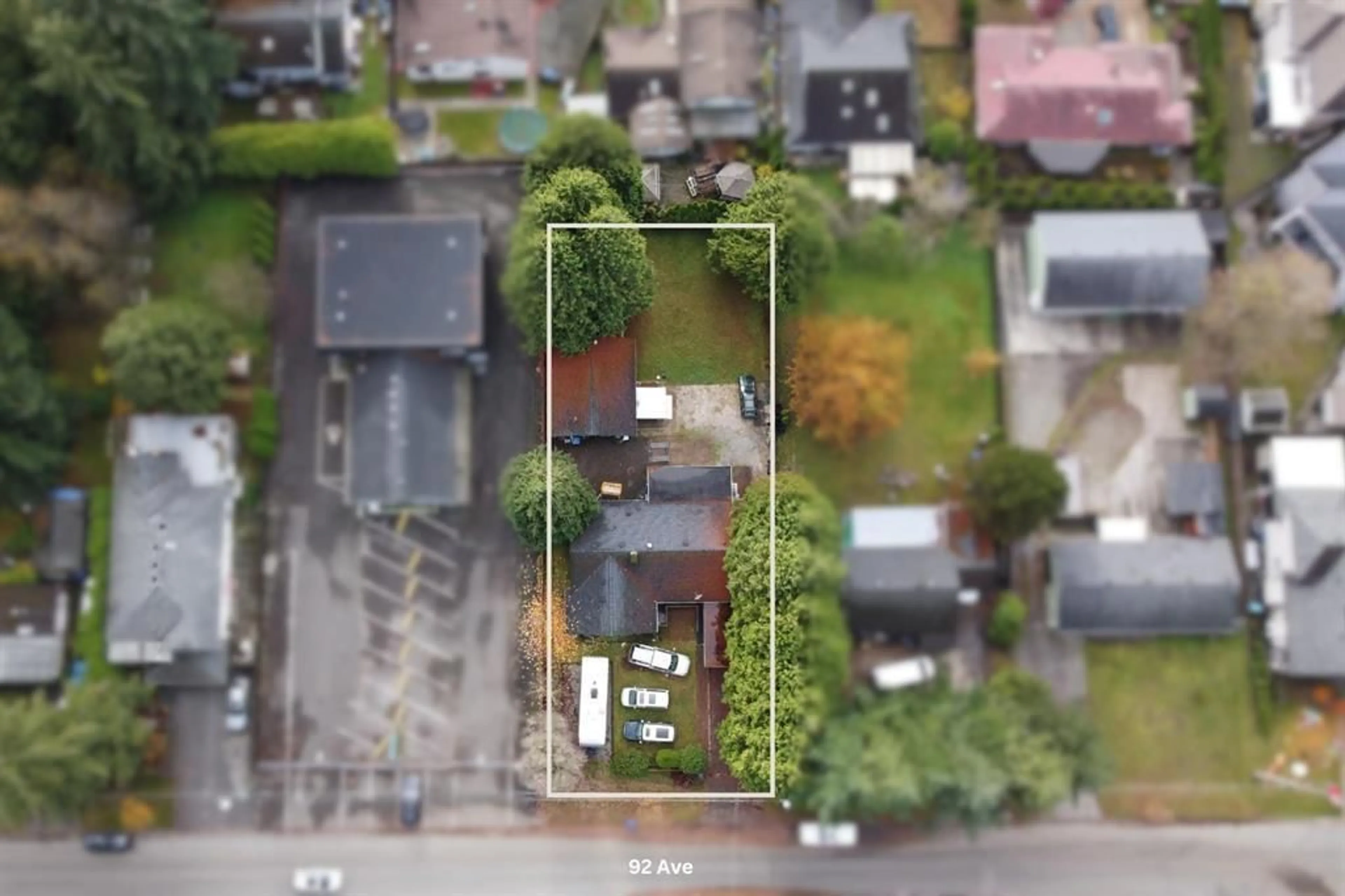 A pic from outside/outdoor area/front of a property/back of a property/a pic from drone, street for 15032 92 AVENUE, Surrey British Columbia V3R5V7