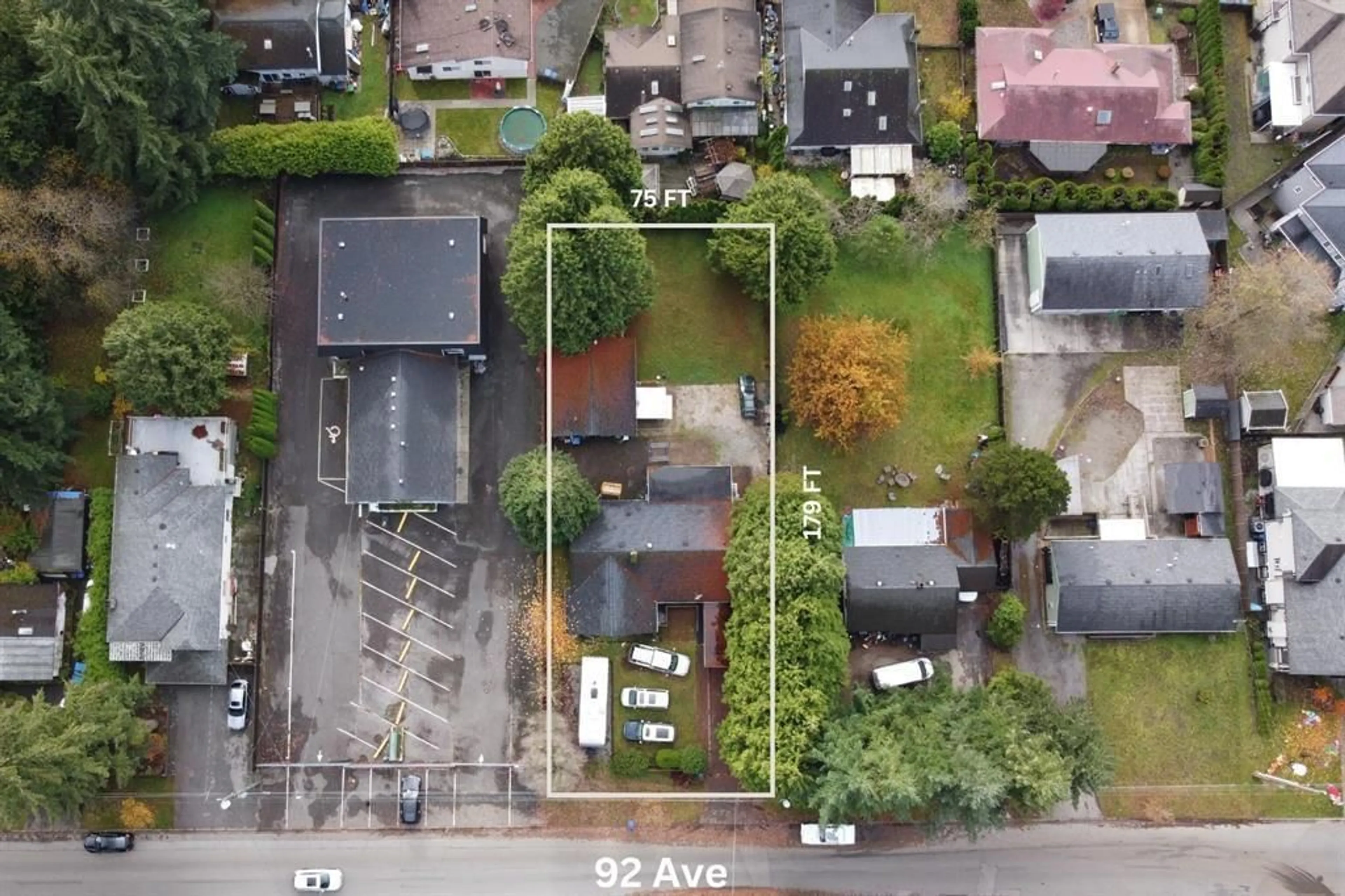 A pic from outside/outdoor area/front of a property/back of a property/a pic from drone, street for 15032 92 AVENUE, Surrey British Columbia V3R5V7