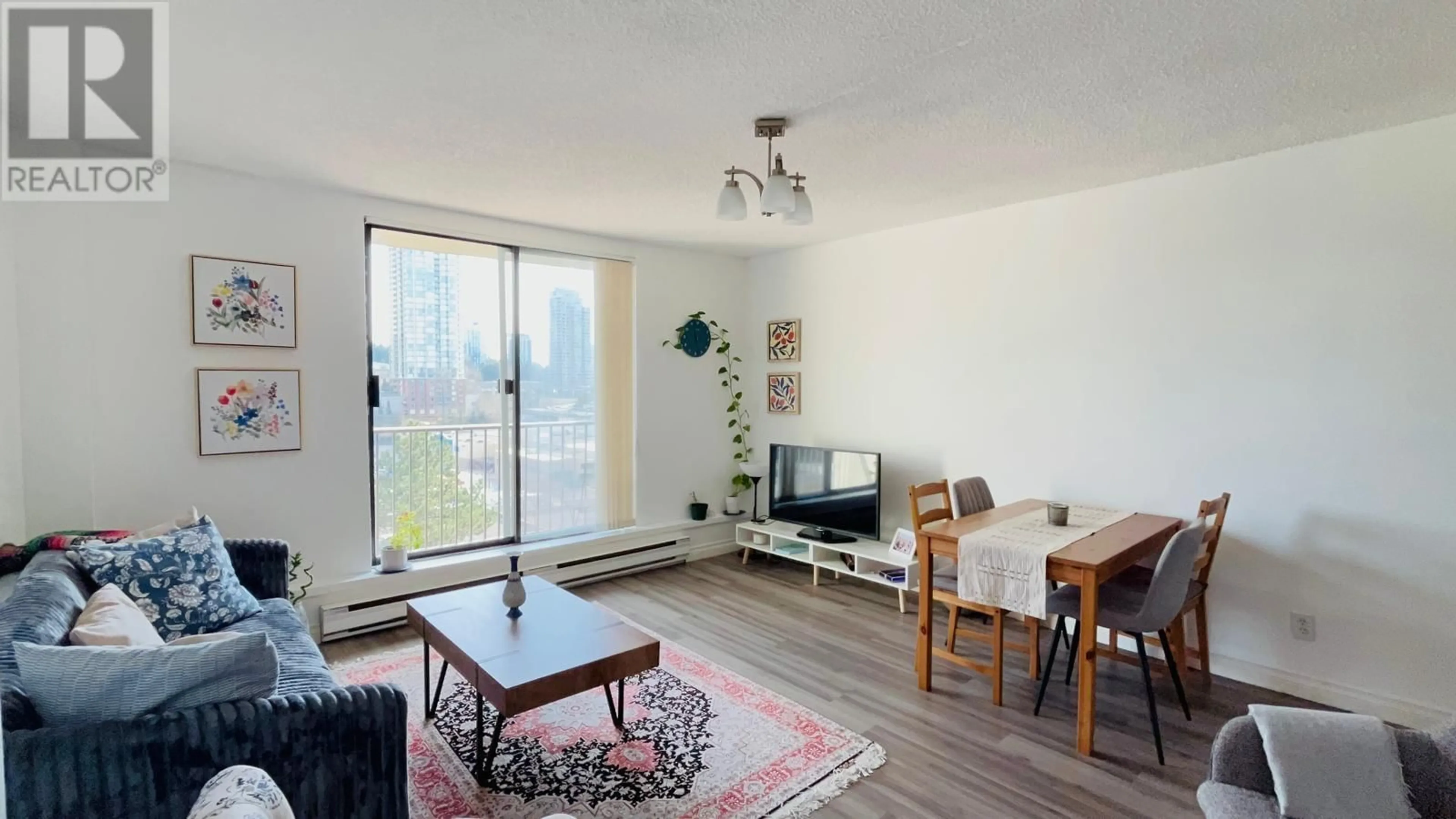 Living room with furniture, wood/laminate floor for 905 - 9595 ERICKSON DRIVE, Burnaby British Columbia V3J7N9