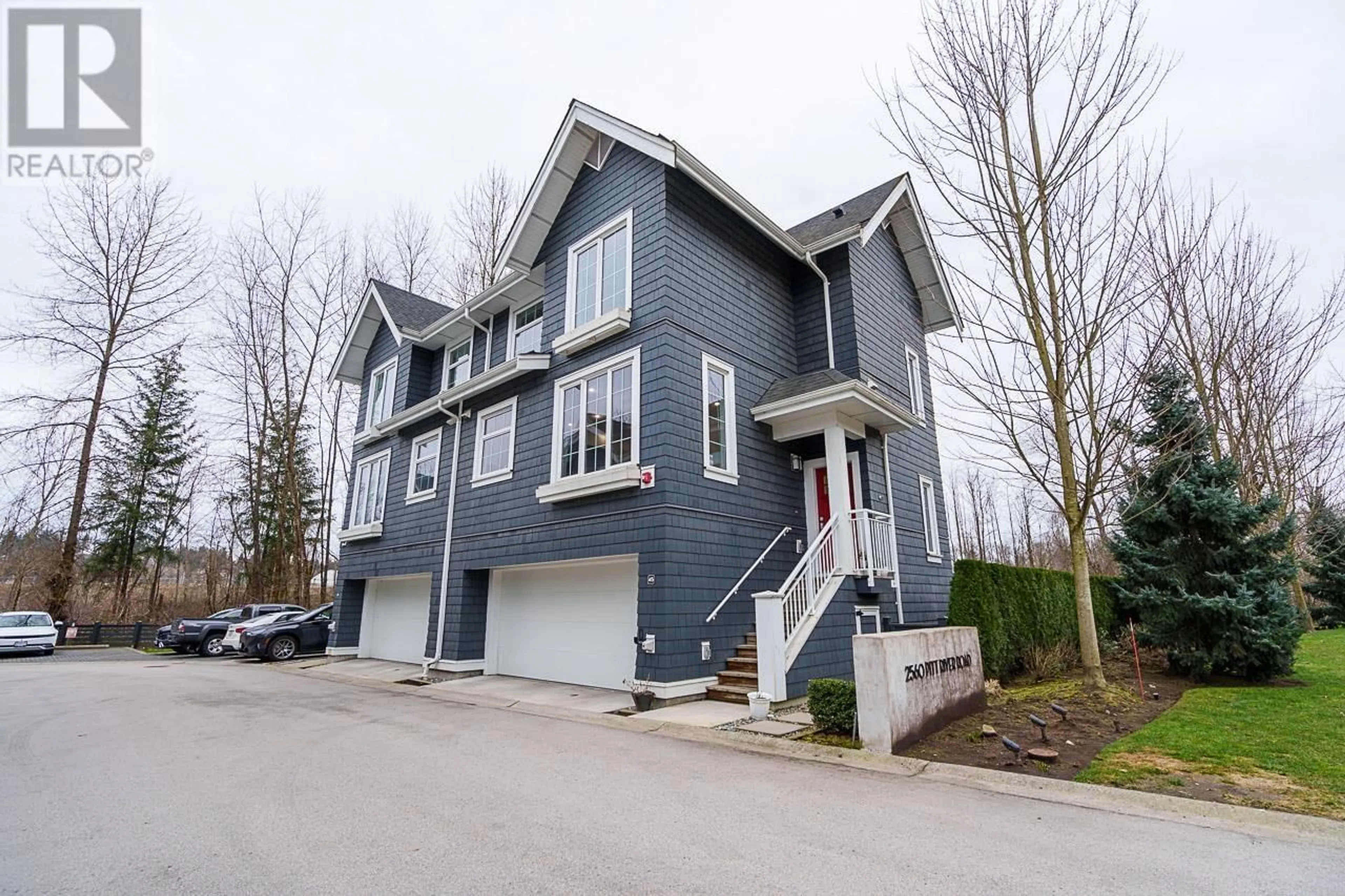 Home with vinyl exterior material, street for 45 2560 PITT RIVER ROAD, Port Coquitlam British Columbia V3C0G6