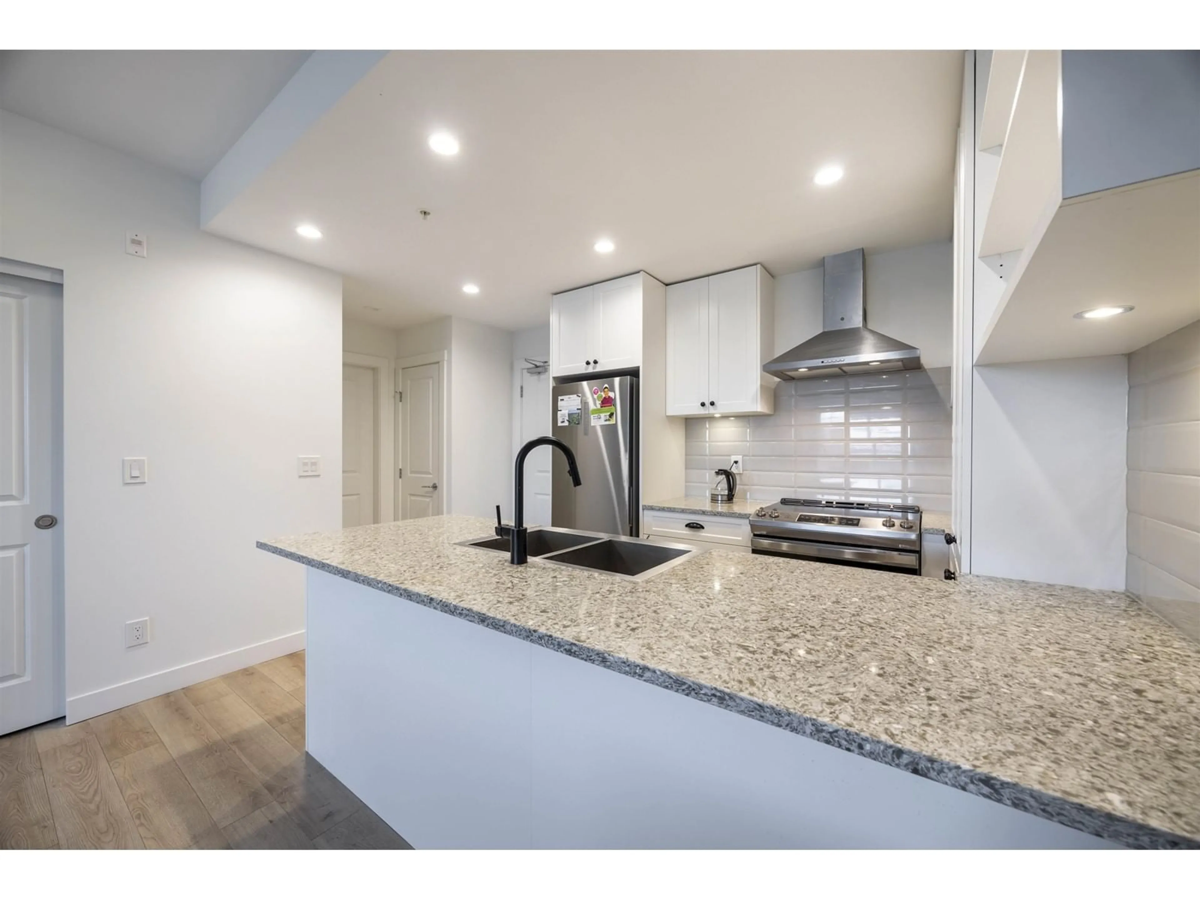 Open concept kitchen, unknown for A202 - 20487 65, Langley British Columbia V2Y3K5