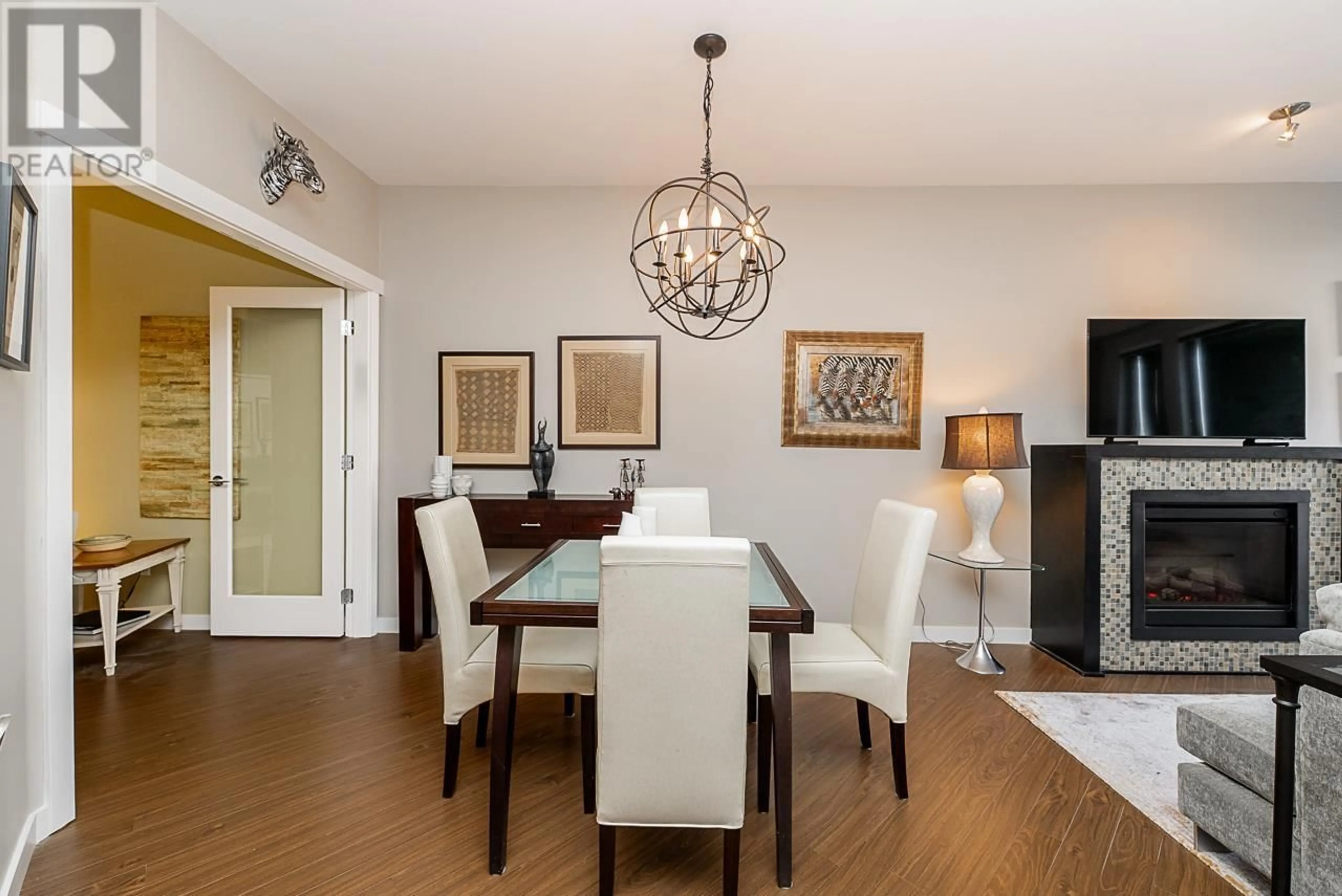 Dining room, wood/laminate floor for 326 119 W 22ND STREET, North Vancouver British Columbia V7M0B4