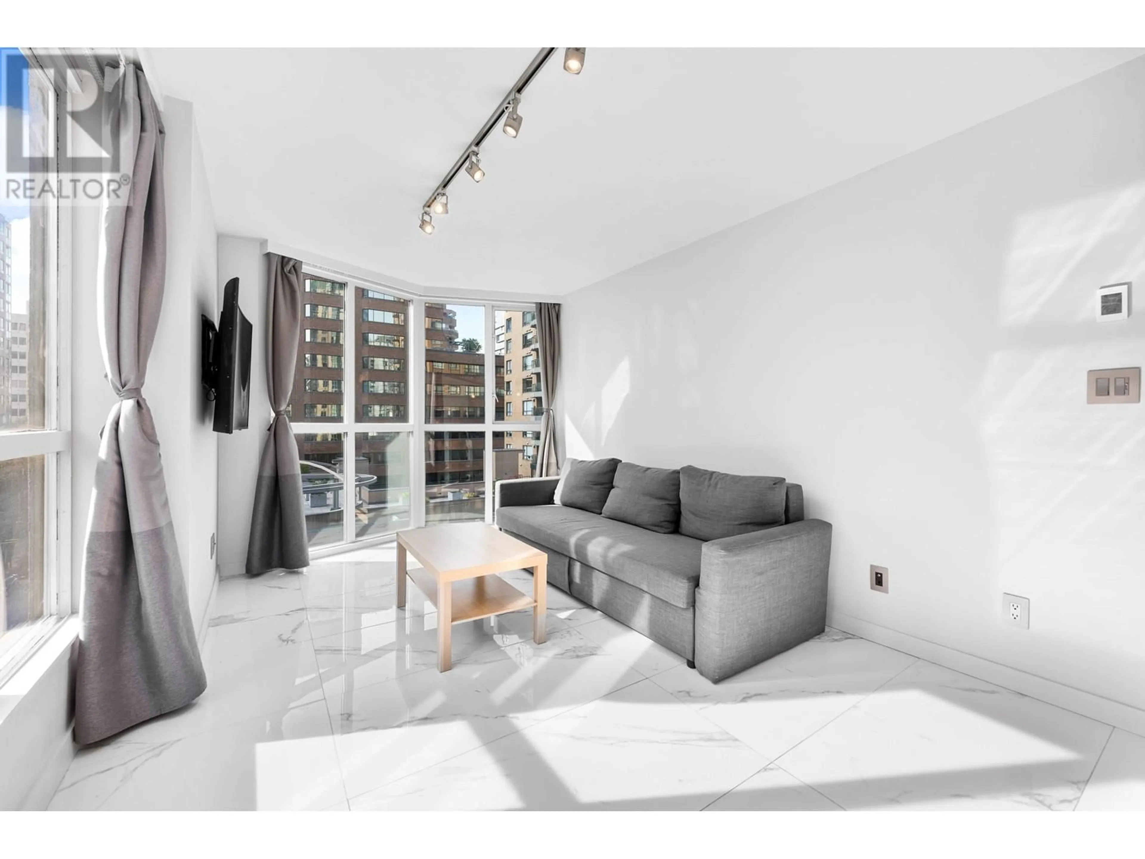 Living room with furniture, unknown for 702 - 1188 HOWE STREET, Vancouver British Columbia V6Z2S8