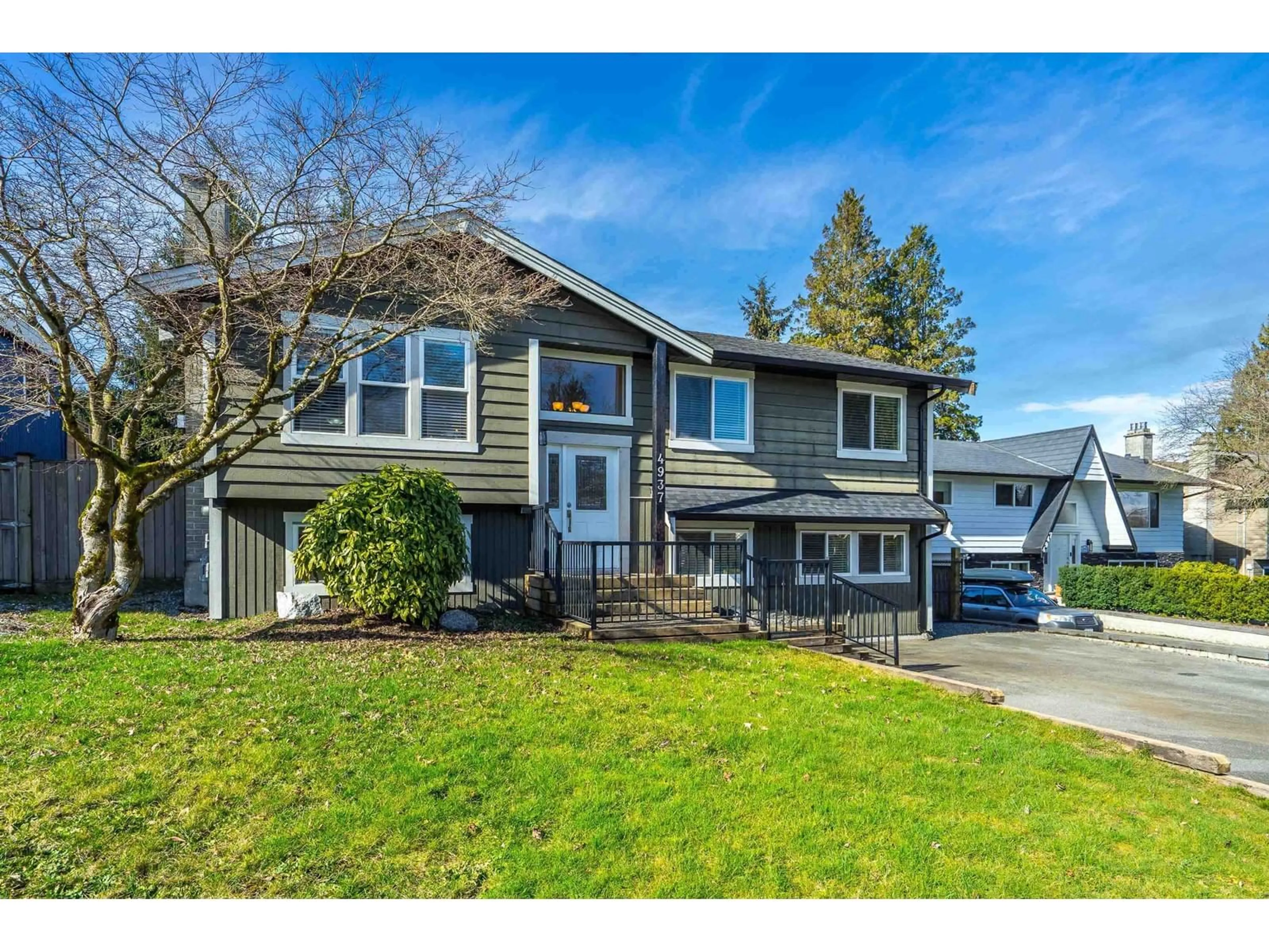 Home with vinyl exterior material, street for 4937 197A STREET, Langley British Columbia V3A6W1