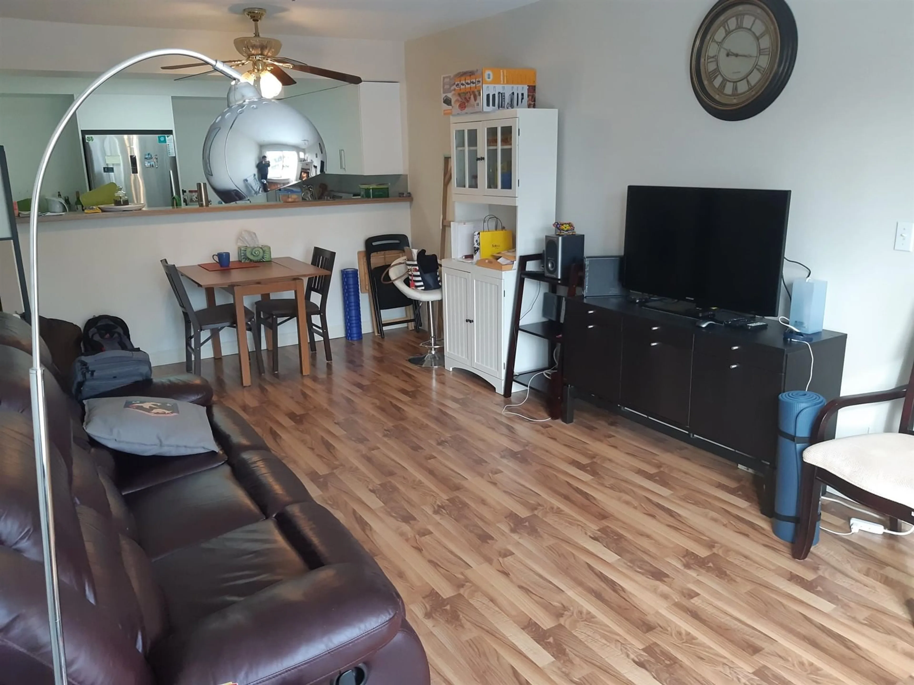 Living room with furniture, wood/laminate floor for B302 9866 WHALLEY BOULEVARD, Surrey British Columbia V3T5S8