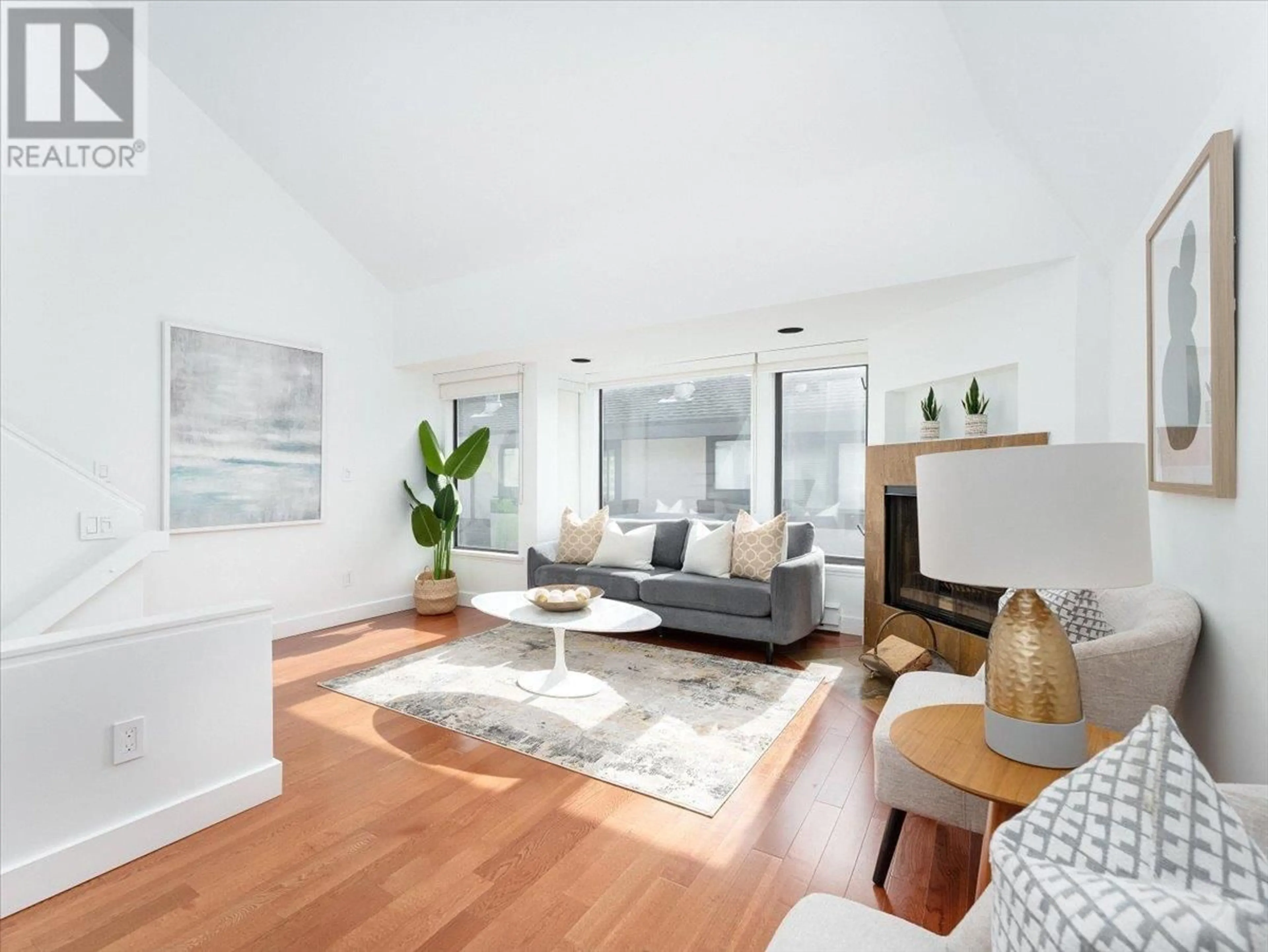 Living room with furniture, wood/laminate floor for 1732 CYPRESS STREET, Vancouver British Columbia V6J4W2