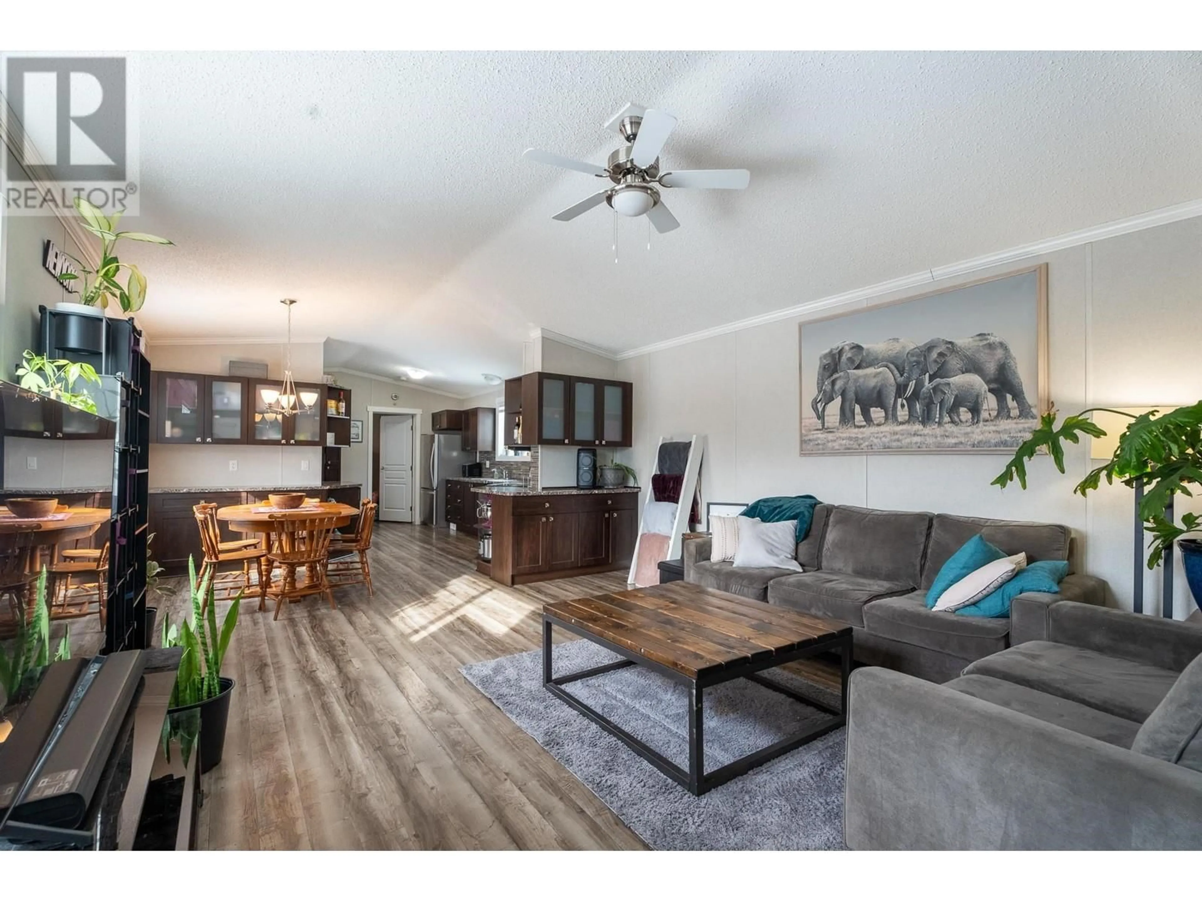 Living room with furniture, wood/laminate floor for D1A 5931 COOK COURT, Prince George British Columbia V2K3A3