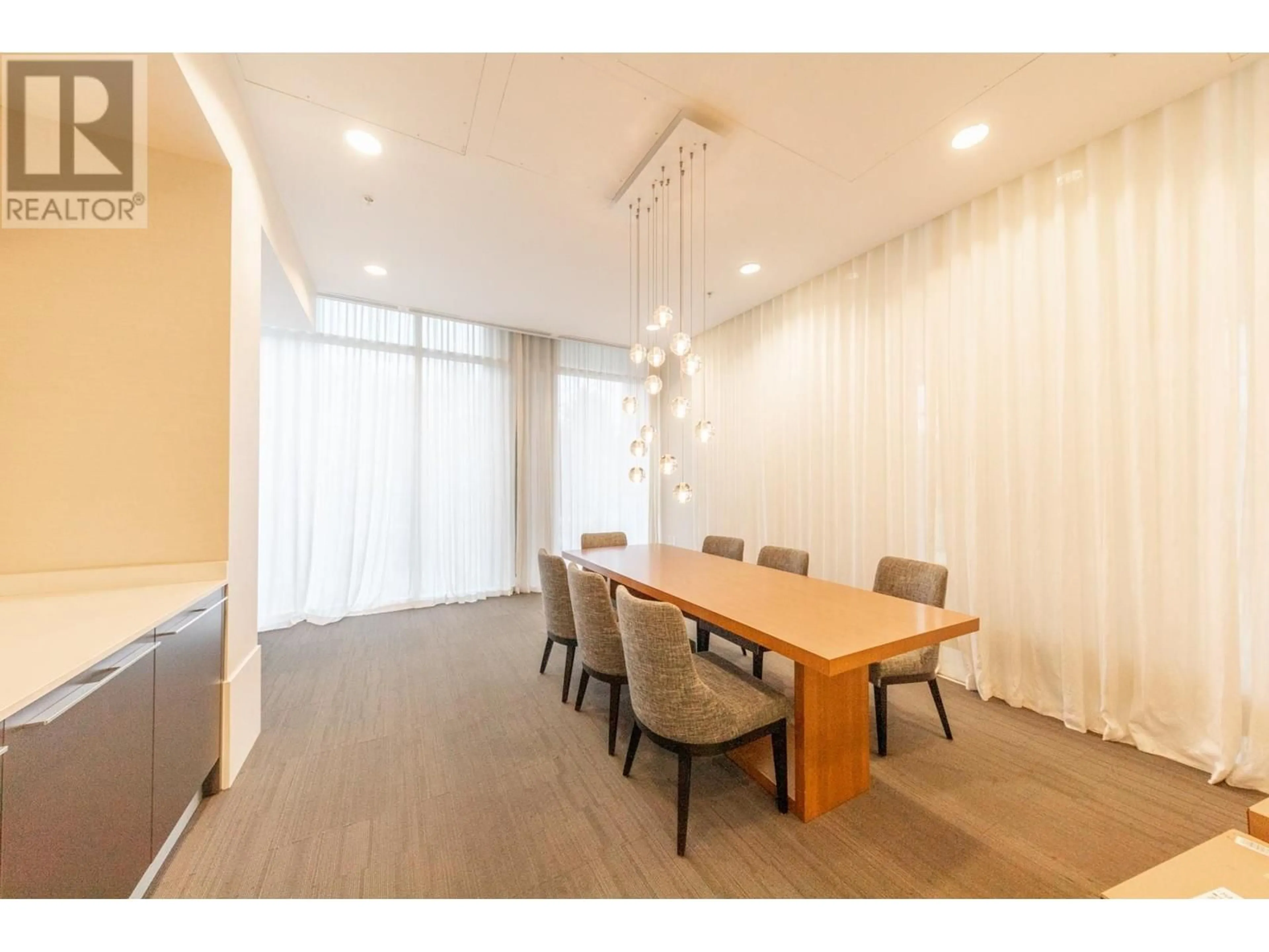 Dining room, wood/laminate floor for 2305 - 8131 NUNAVUT LANE, Vancouver British Columbia V5X0E2