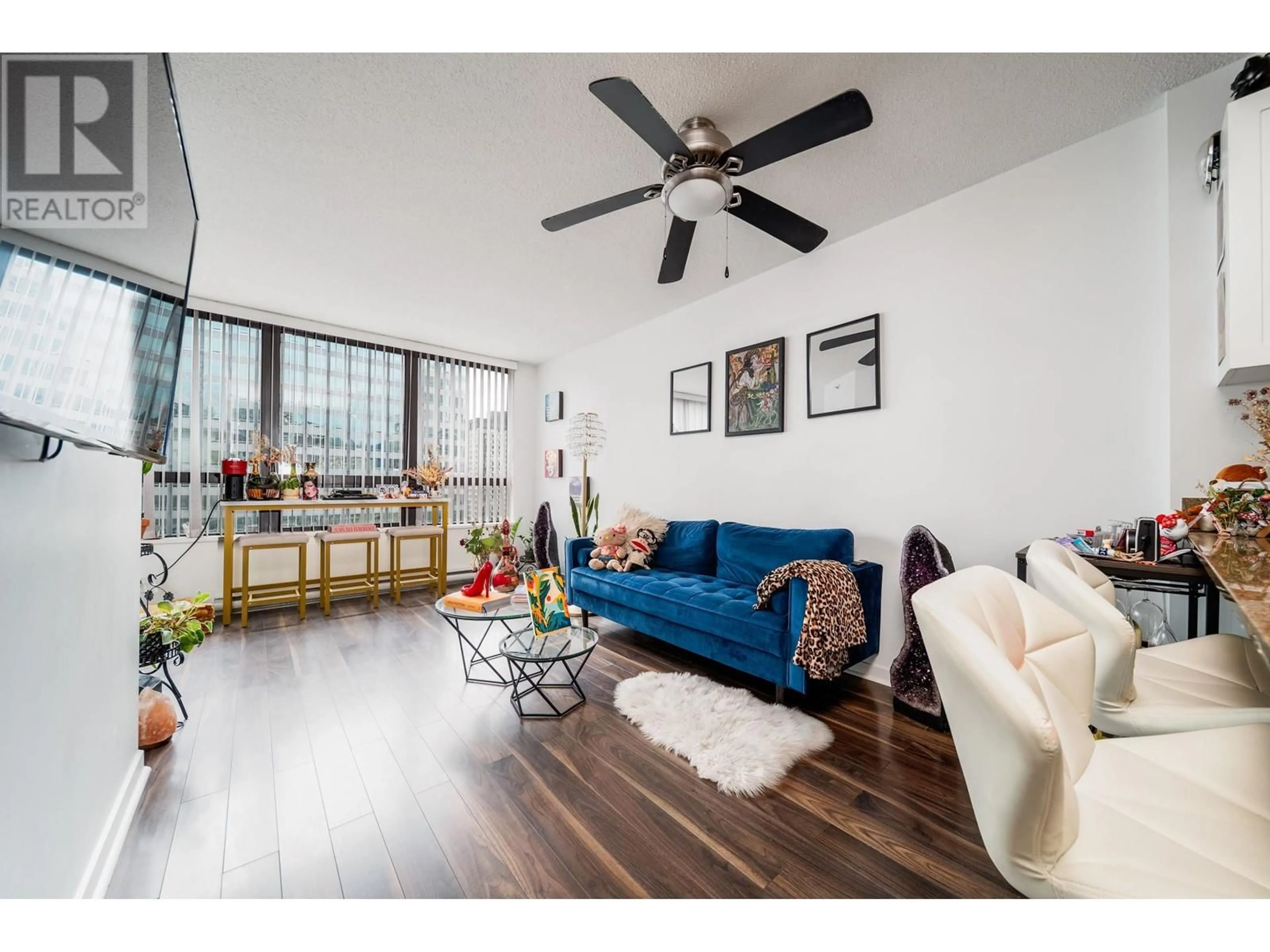 Living room with furniture, wood/laminate floor for 1907 938 SMITHE STREET, Vancouver British Columbia V6Z3H8