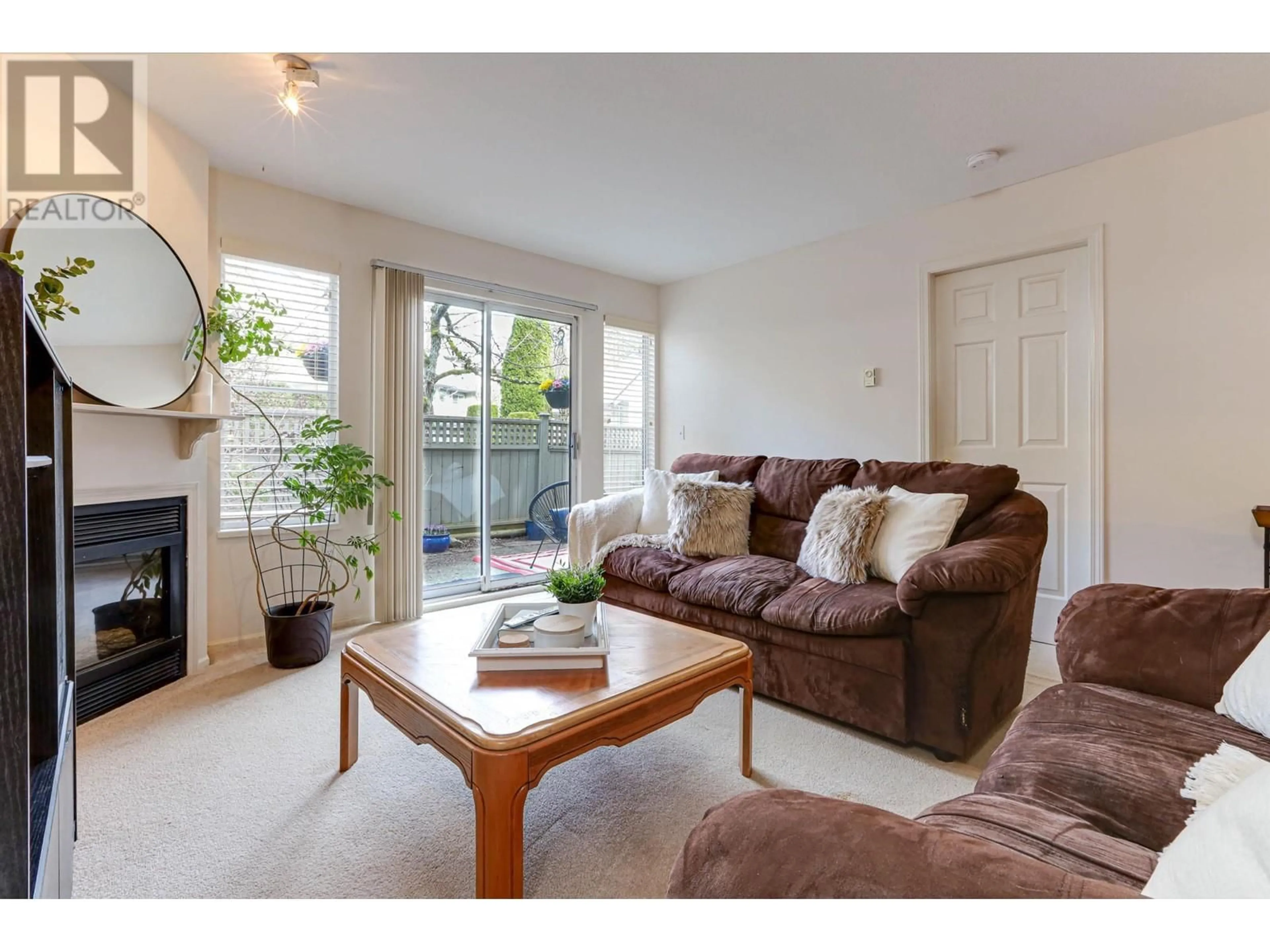 Living room with furniture, wood/laminate floor for 14 19034 MCMYN ROAD, Pitt Meadows British Columbia V3Y2N8