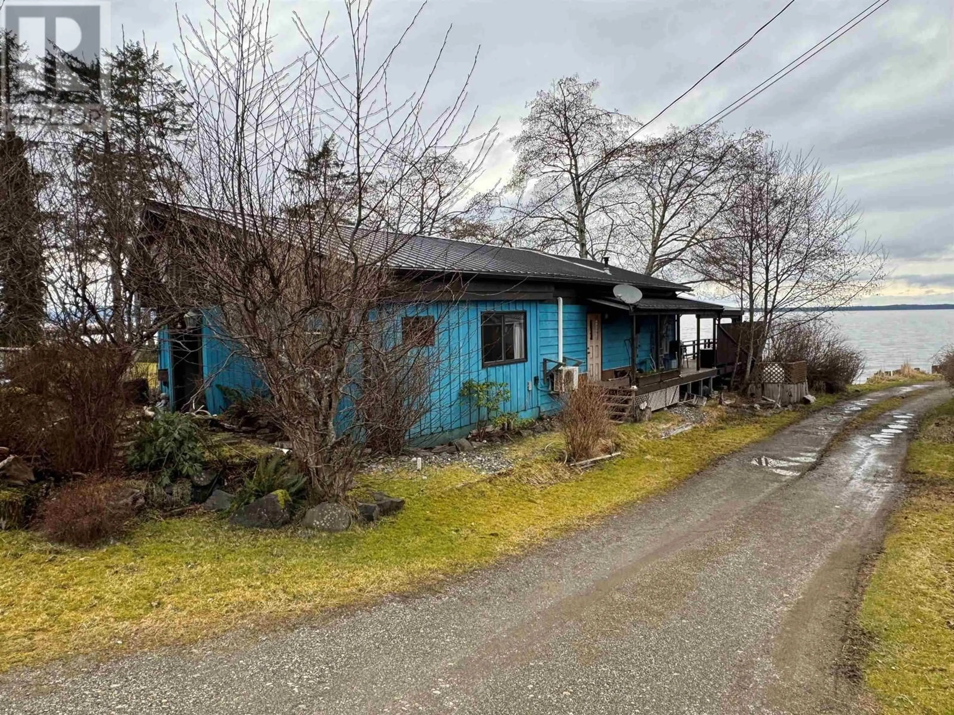 A pic from outside/outdoor area/front of a property/back of a property/a pic from drone, street for 101 BAYVIEW DRIVE, Port Clements British Columbia V0T1R0
