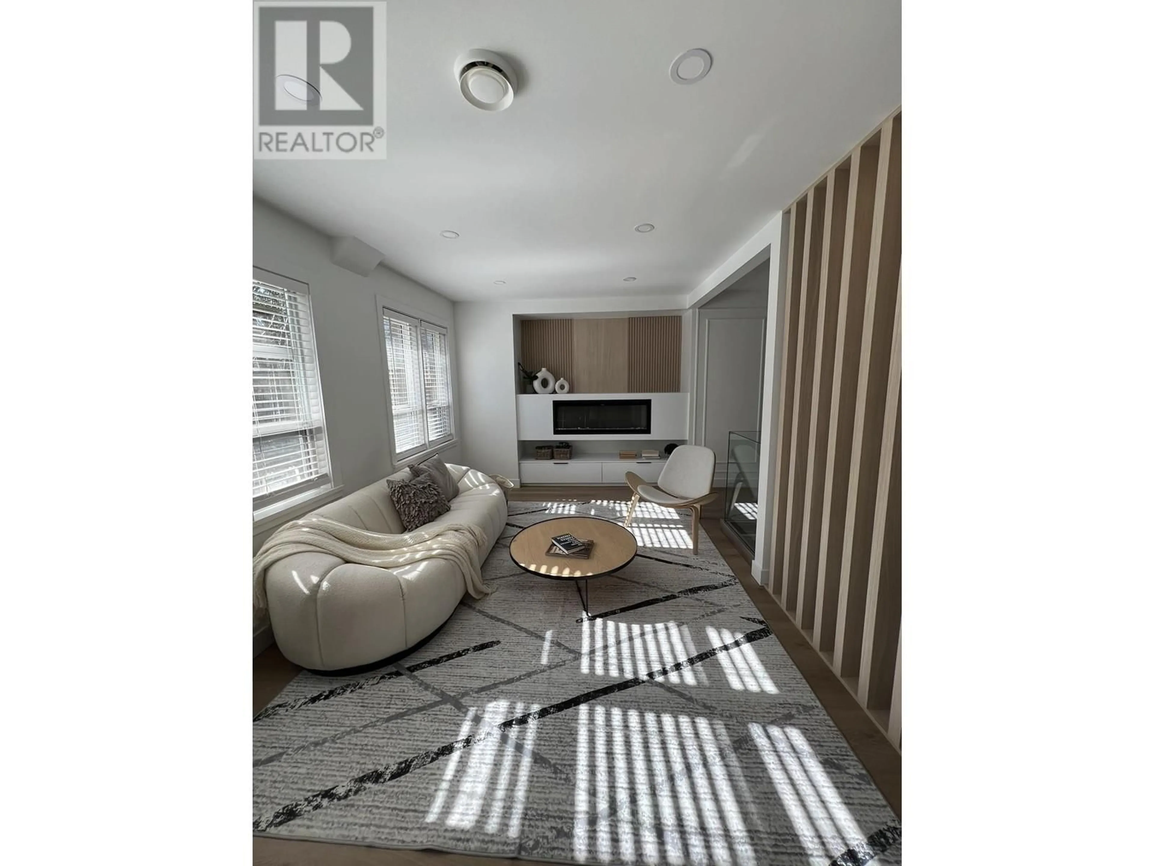 Living room with furniture, wood/laminate floor for 3534 W 17TH AVENUE, Vancouver British Columbia V6S1A1