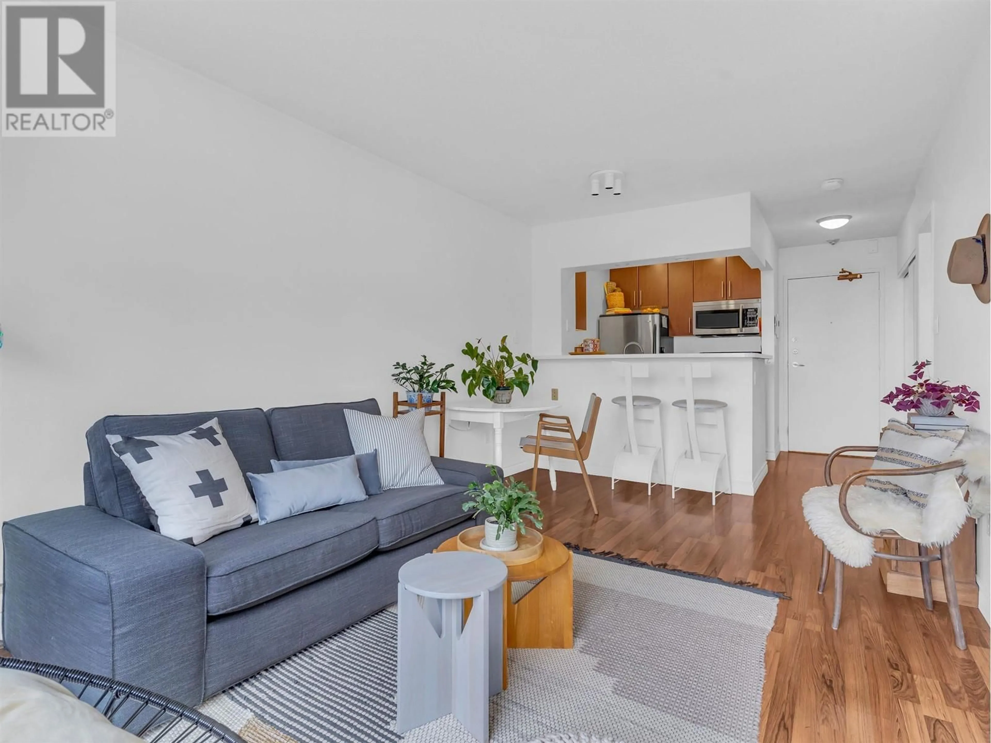 Living room with furniture, wood/laminate floor for 302 2330 MAPLE STREET, Vancouver British Columbia V6J3T6