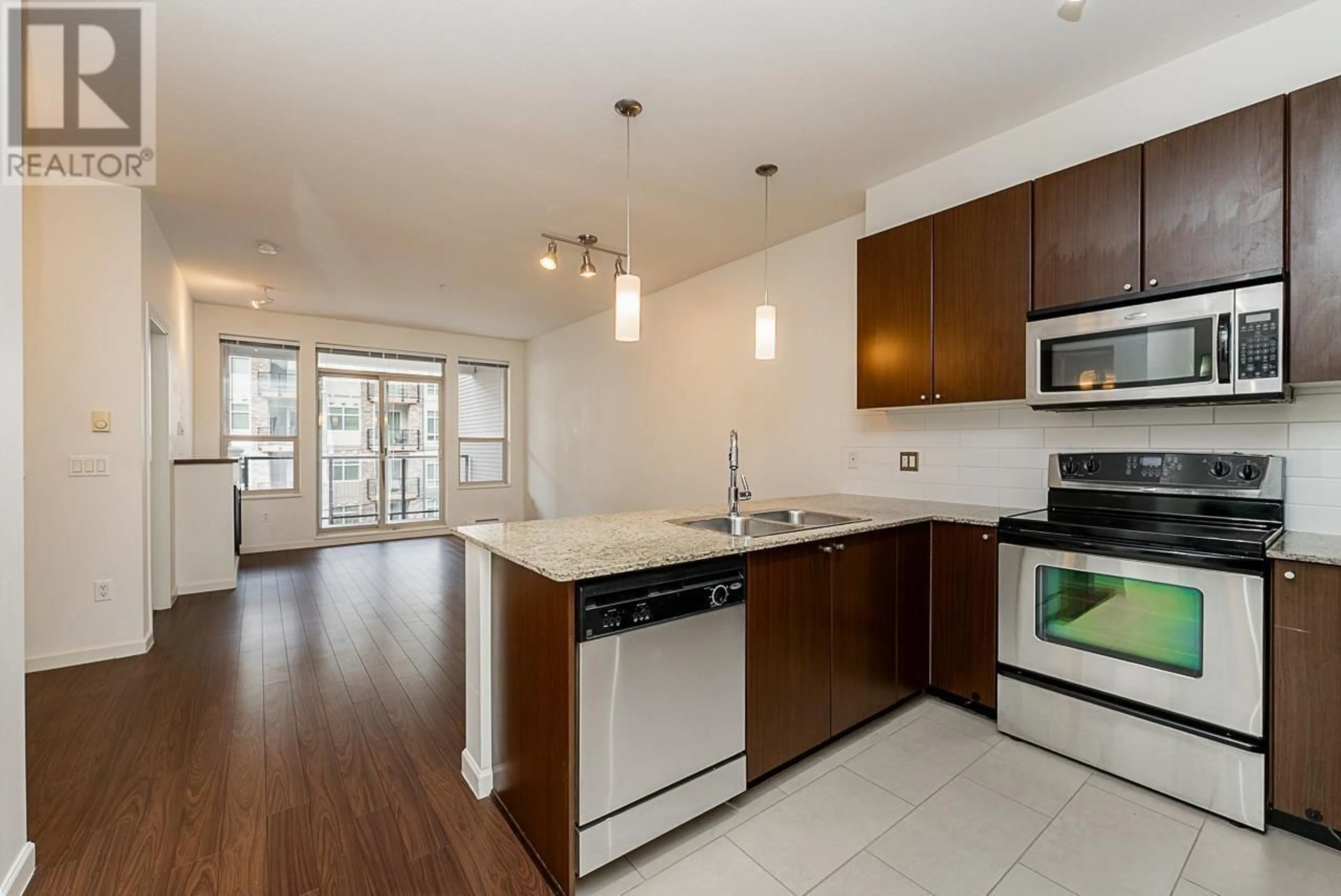 Open concept kitchen, unknown for 311 2484 WILSON AVENUE, Port Coquitlam British Columbia V3C0A5